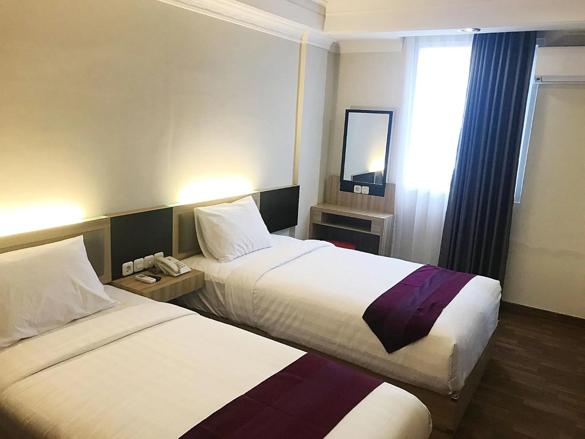 Bed in Top Malioboro Hotel Jogja