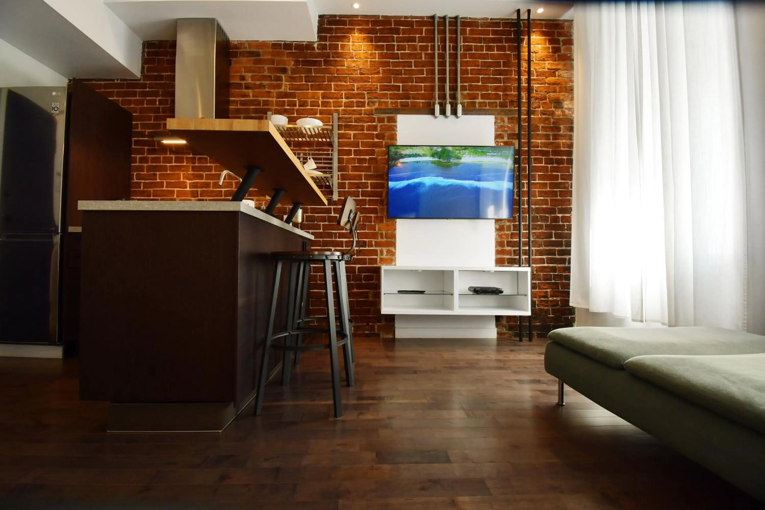 TV and multimedia in Maison Évangéline by Bower Boutique Hotels