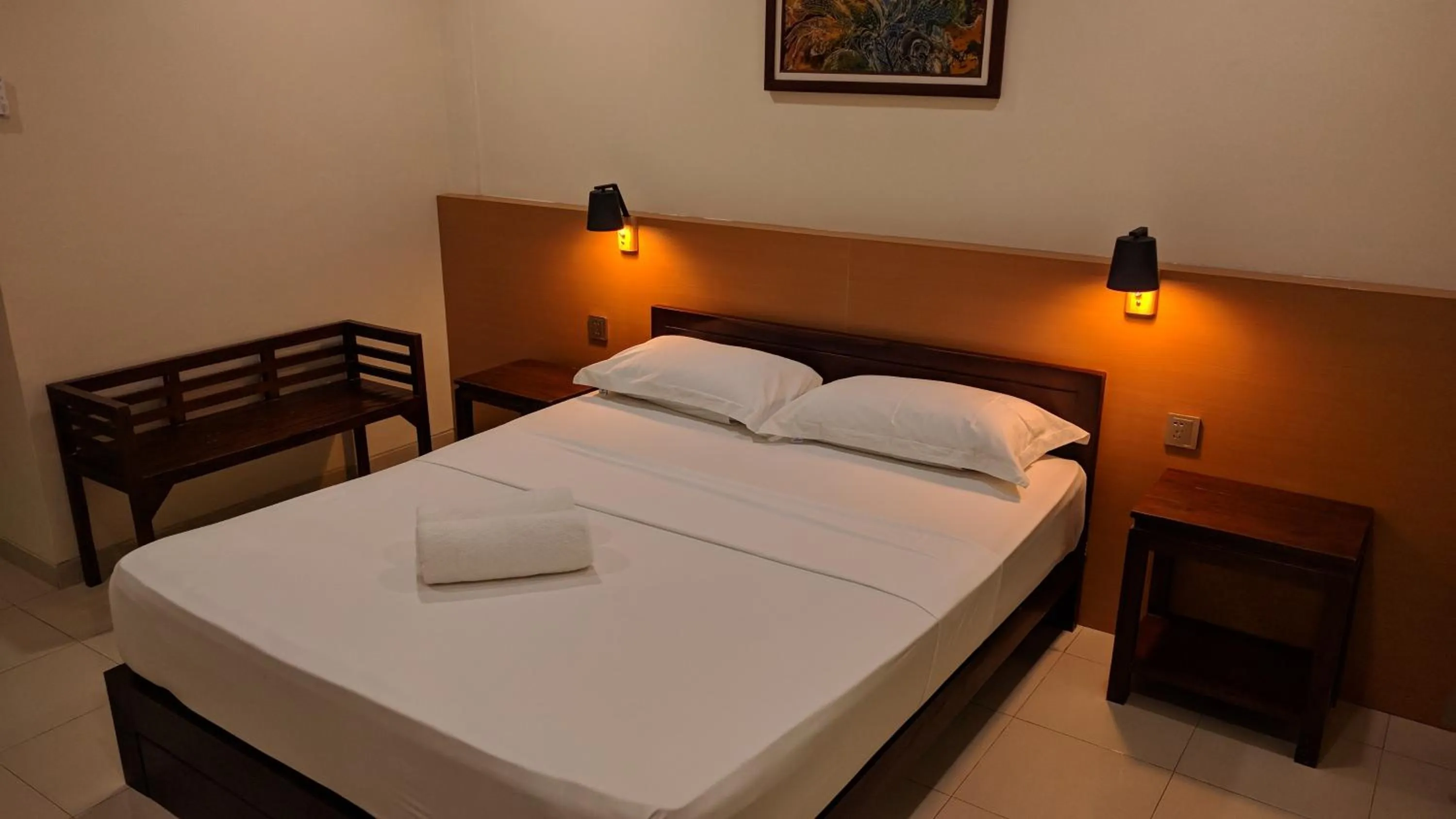 Bed in Puri Pangeran Hotel