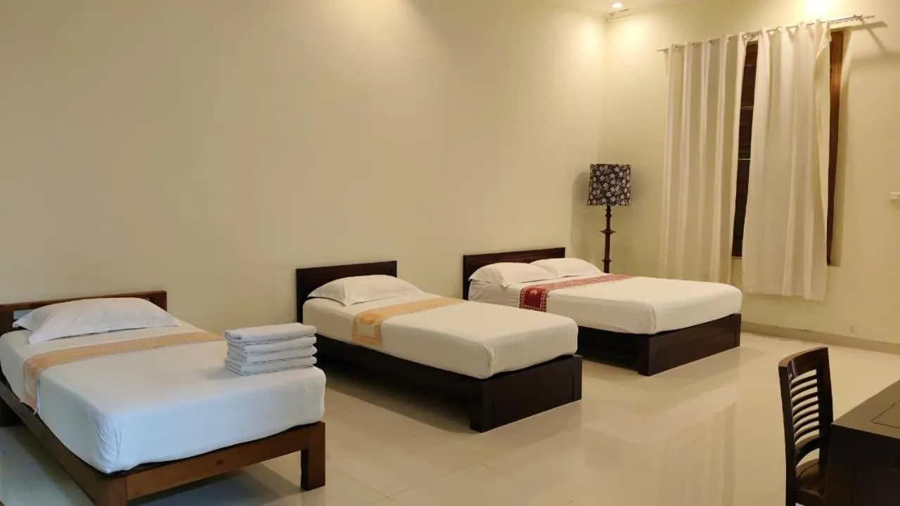 Bed in Puri Pangeran Hotel