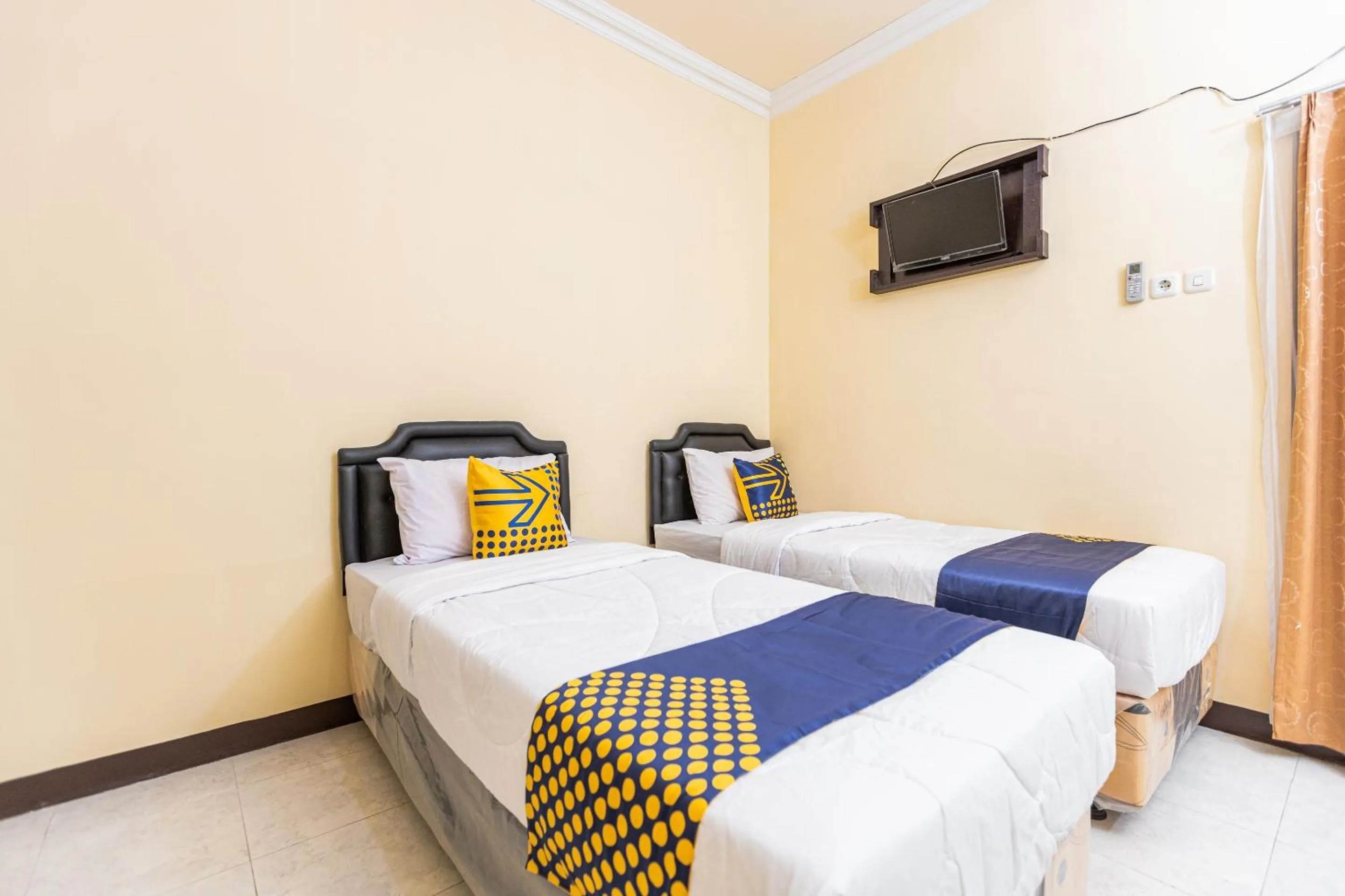 Bedroom in Hotel O Pondok Ripuji