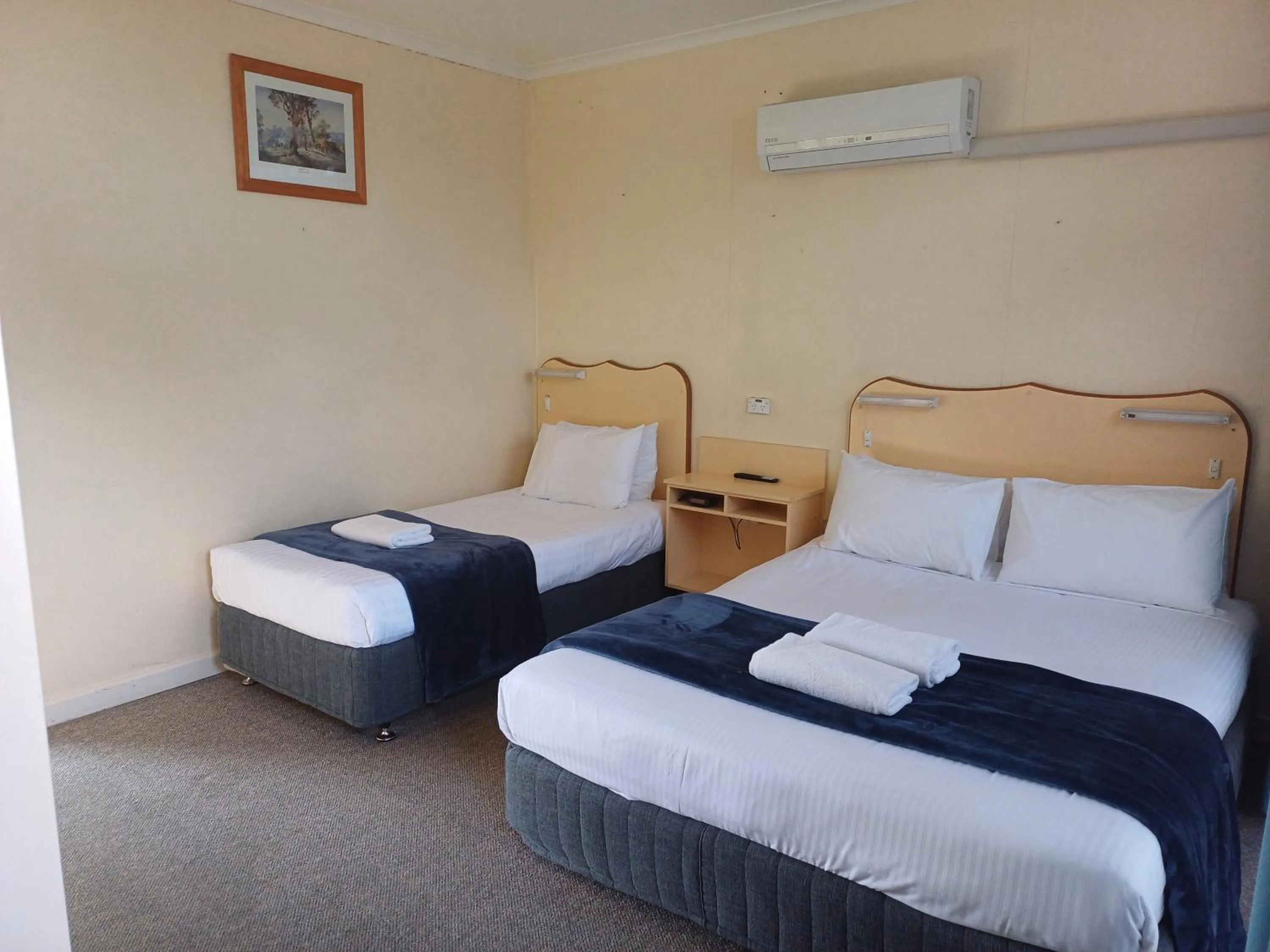 Bed in Billabong Motel