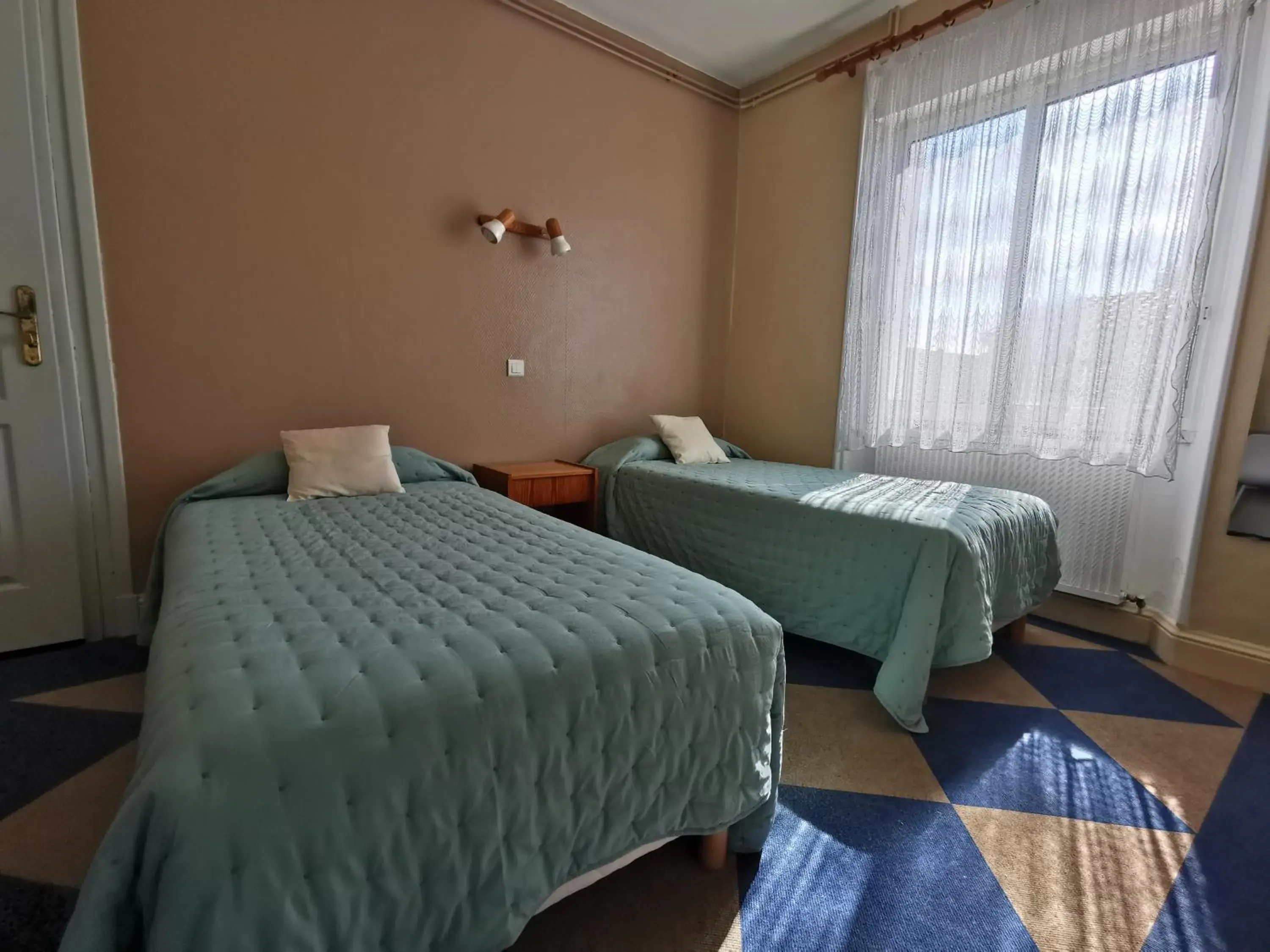 Twin Room with Garden View in Hotel le Pasteur Twin Room with Garden View in Hotel le Pasteur