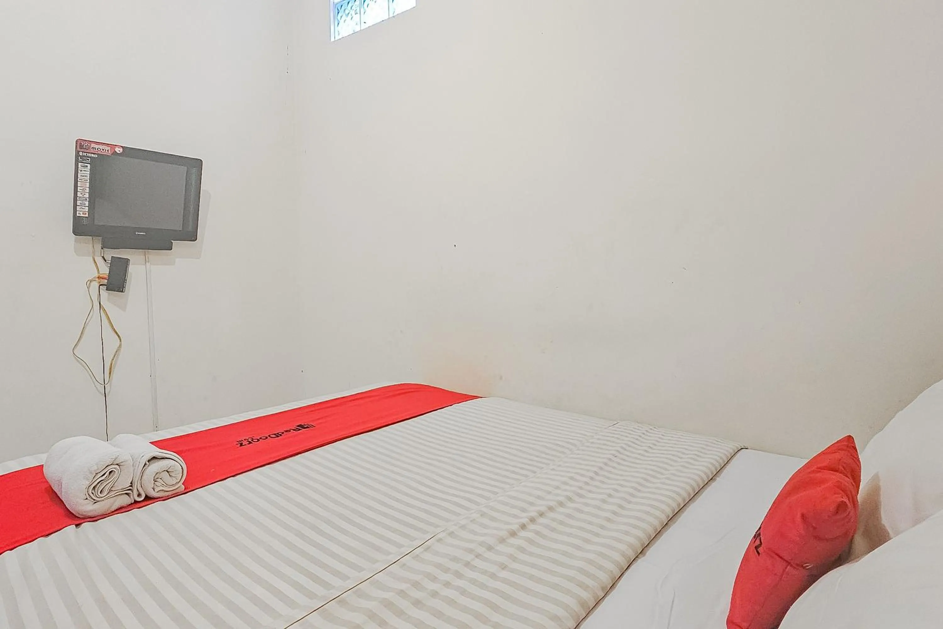 Bed in OYO 1982 Golf Papa Costel