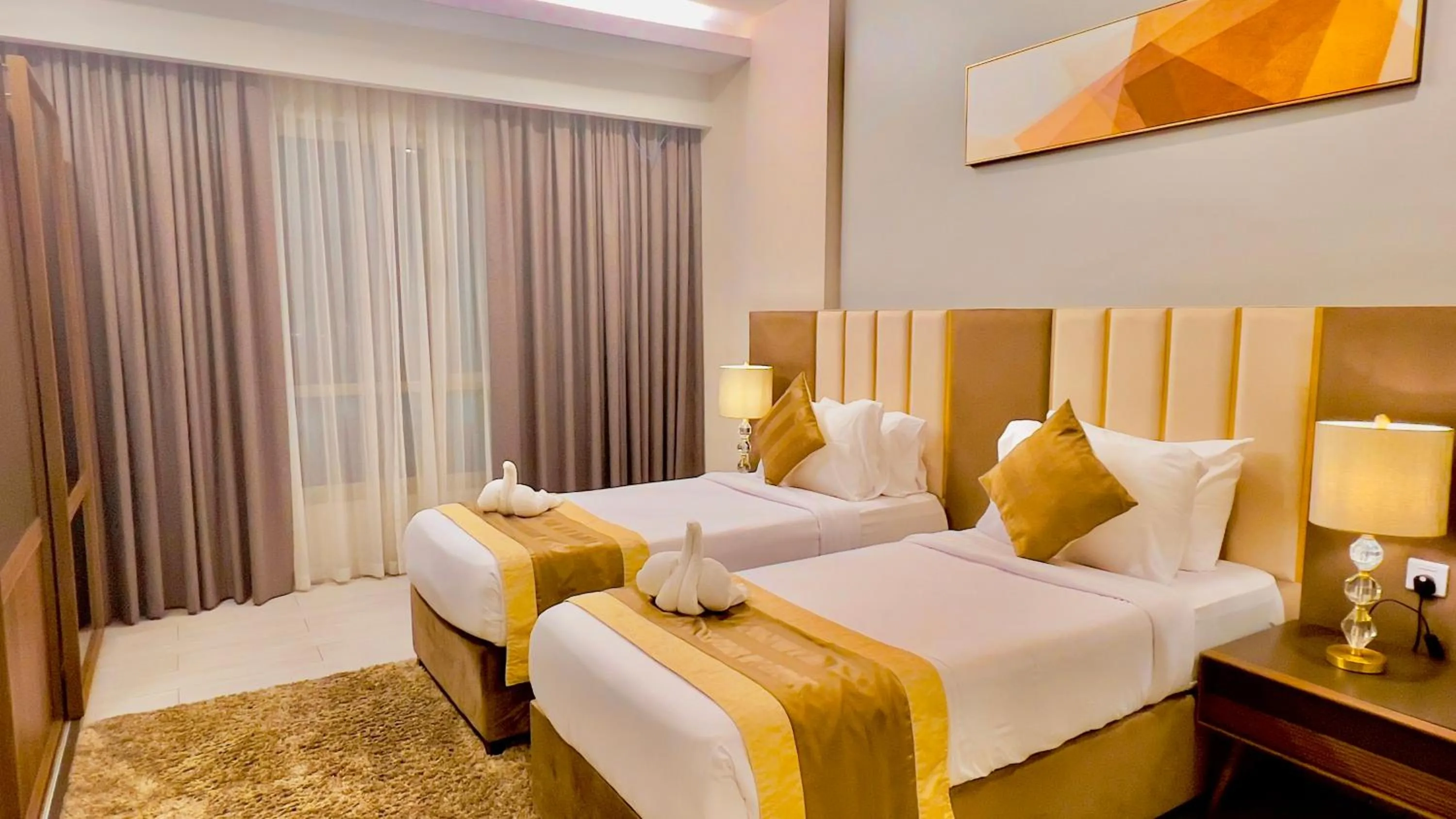 Bed in BW Suites & Spa