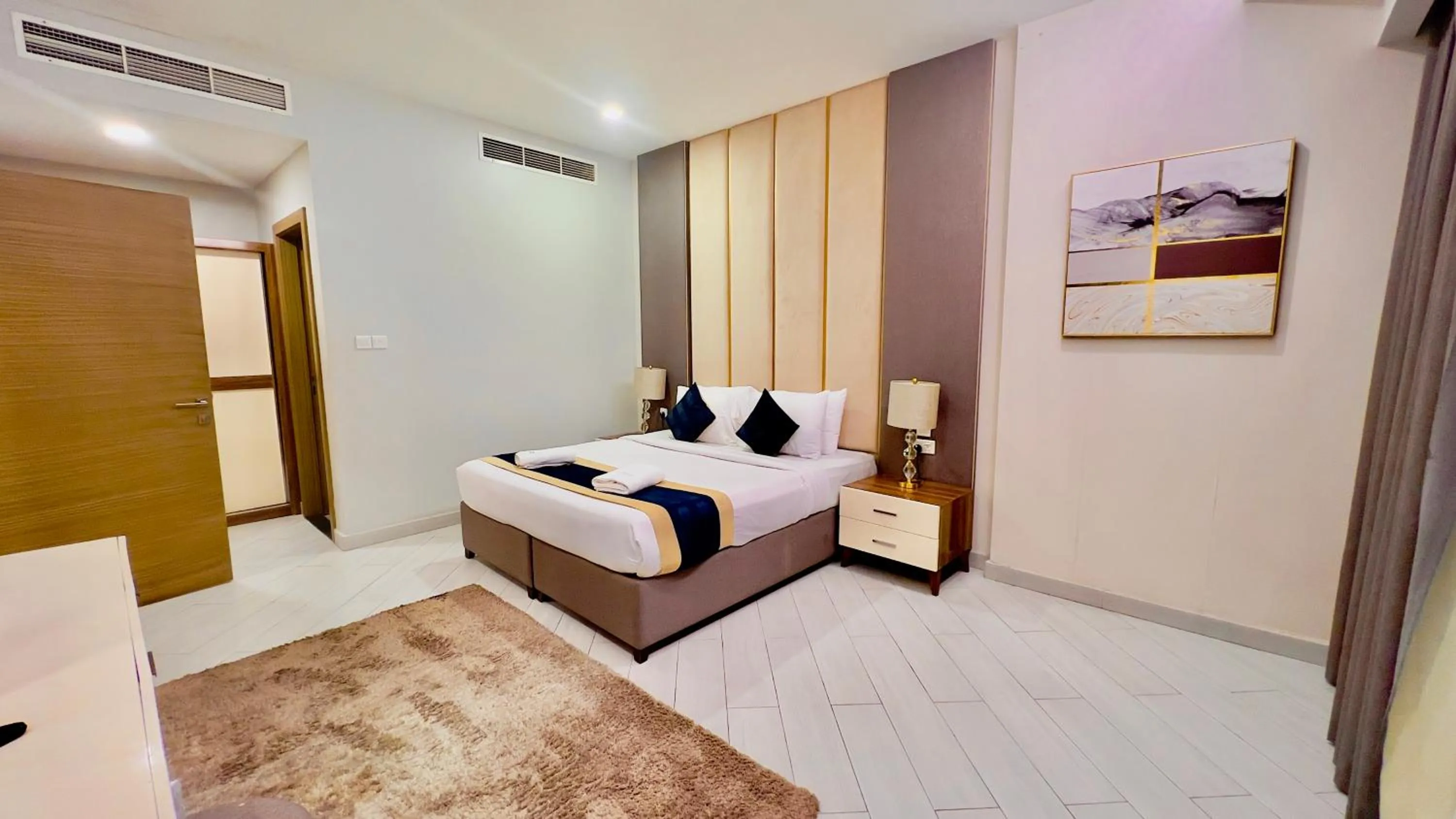 Bed in BW Suites & Spa