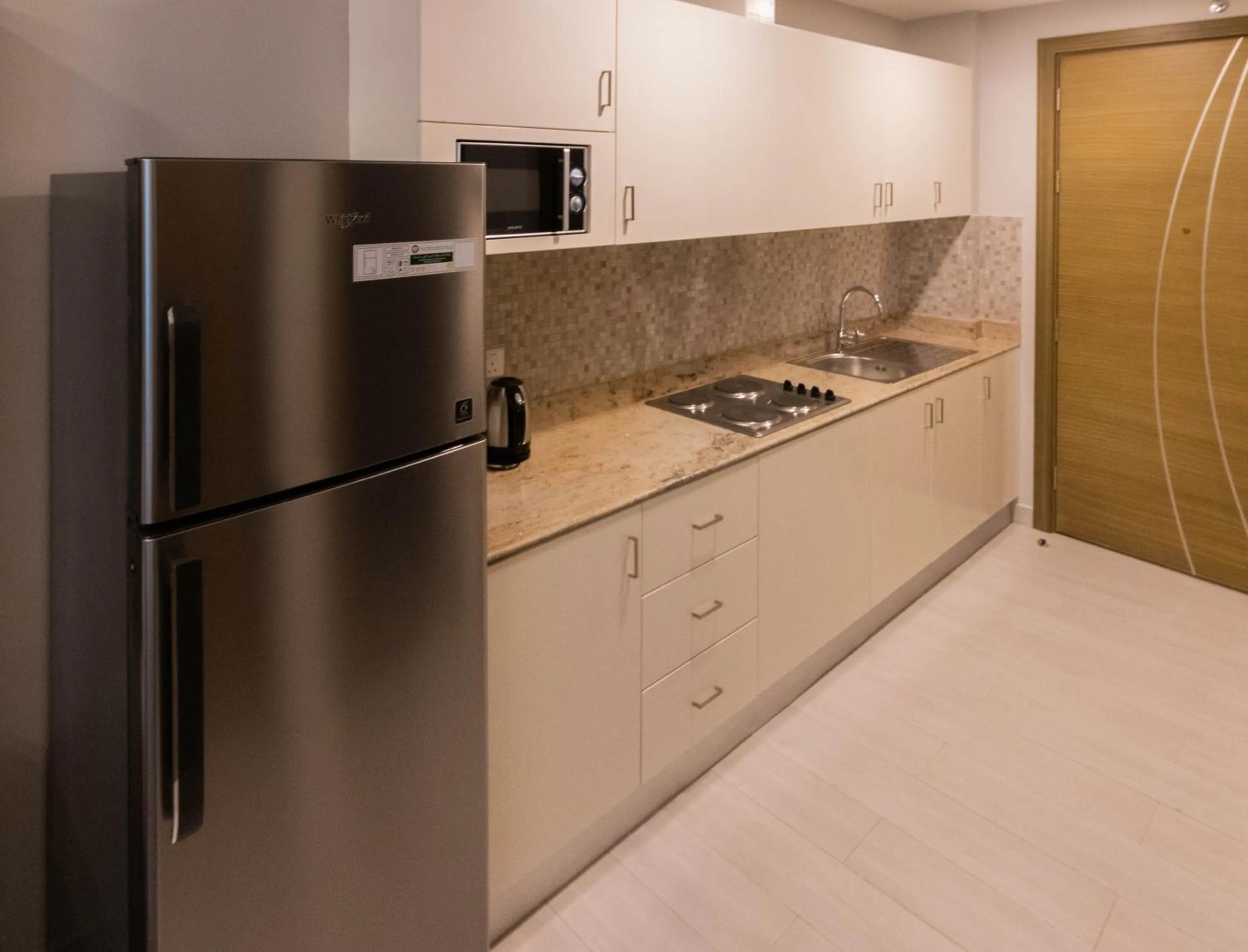 Kitchen or kitchenette in BW Suites & Spa
