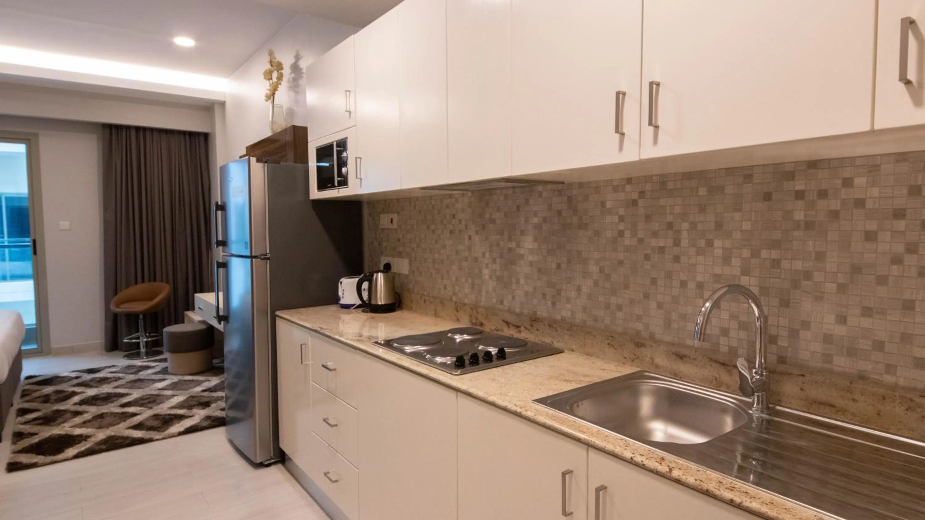 Kitchen or kitchenette in BW Suites & Spa