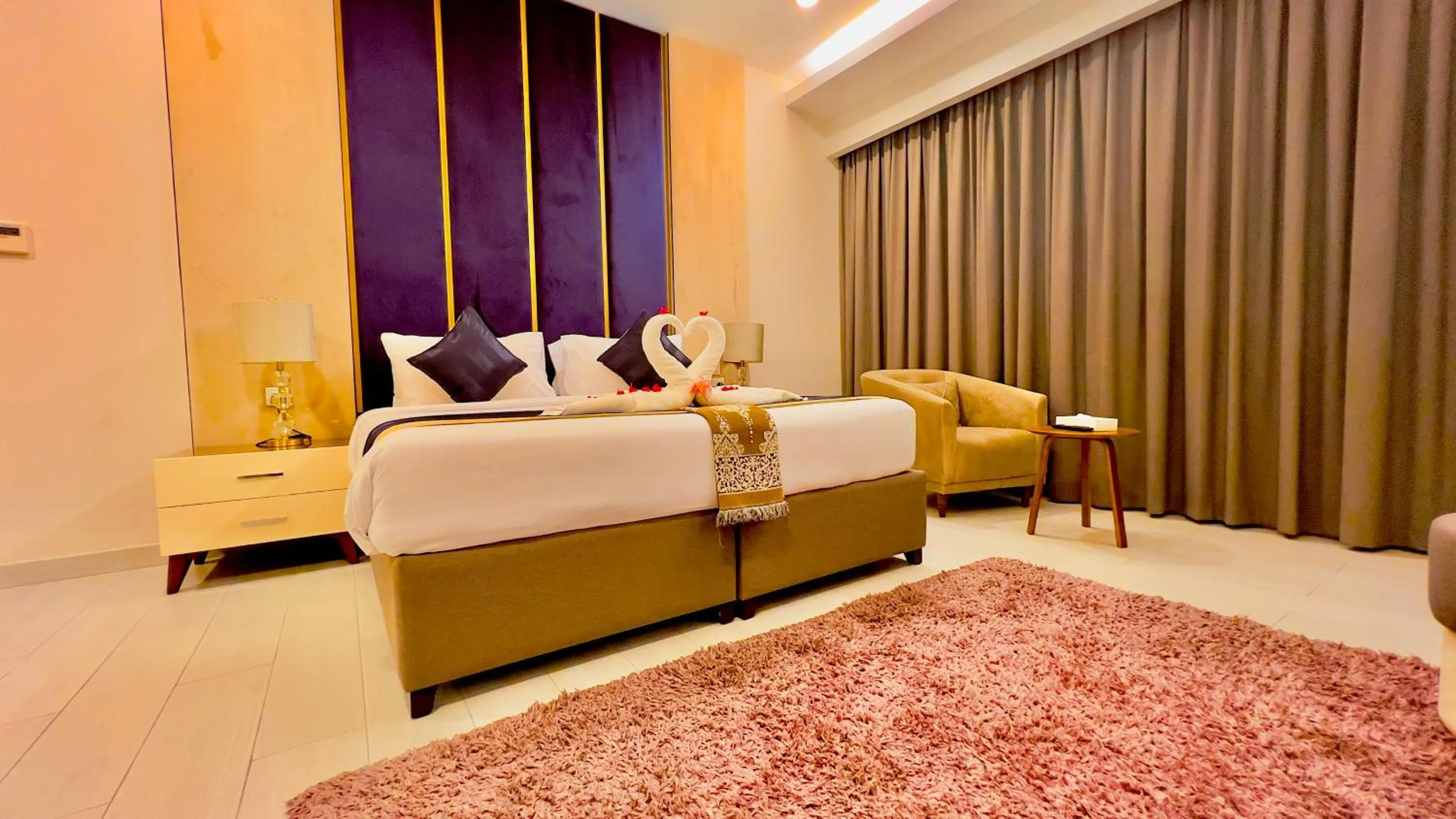 Bed in BW Suites & Spa