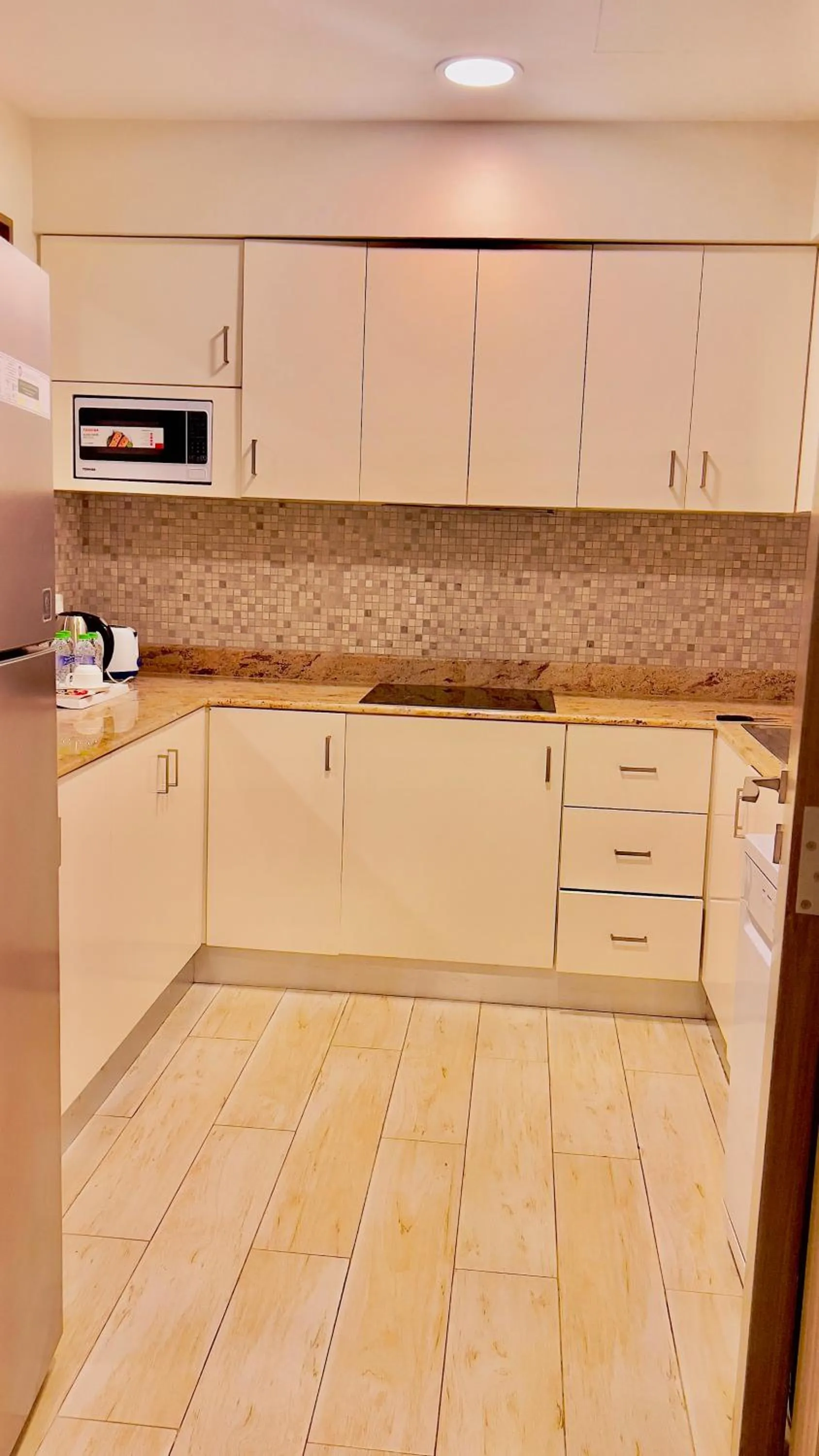 Kitchen or kitchenette in BW Suites & Spa