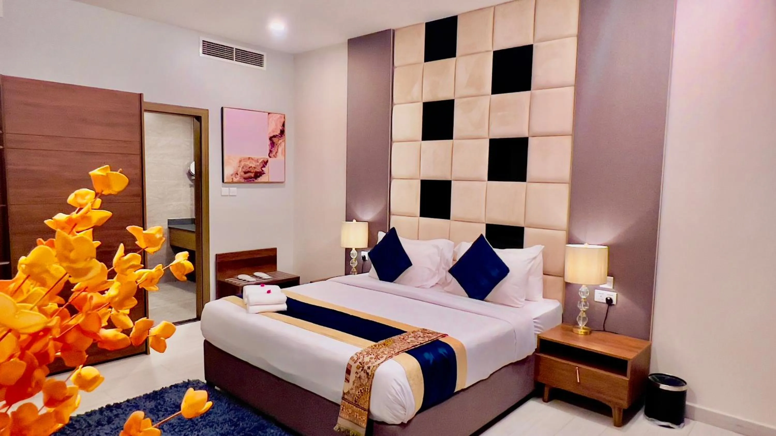 Seating area, Bed in BW Suites & Spa