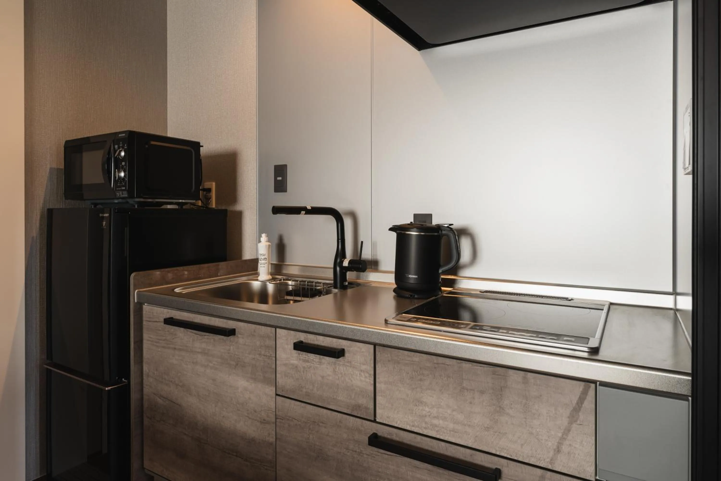 Kitchen or kitchenette in GRAND BASE Beppu Ekihigashi