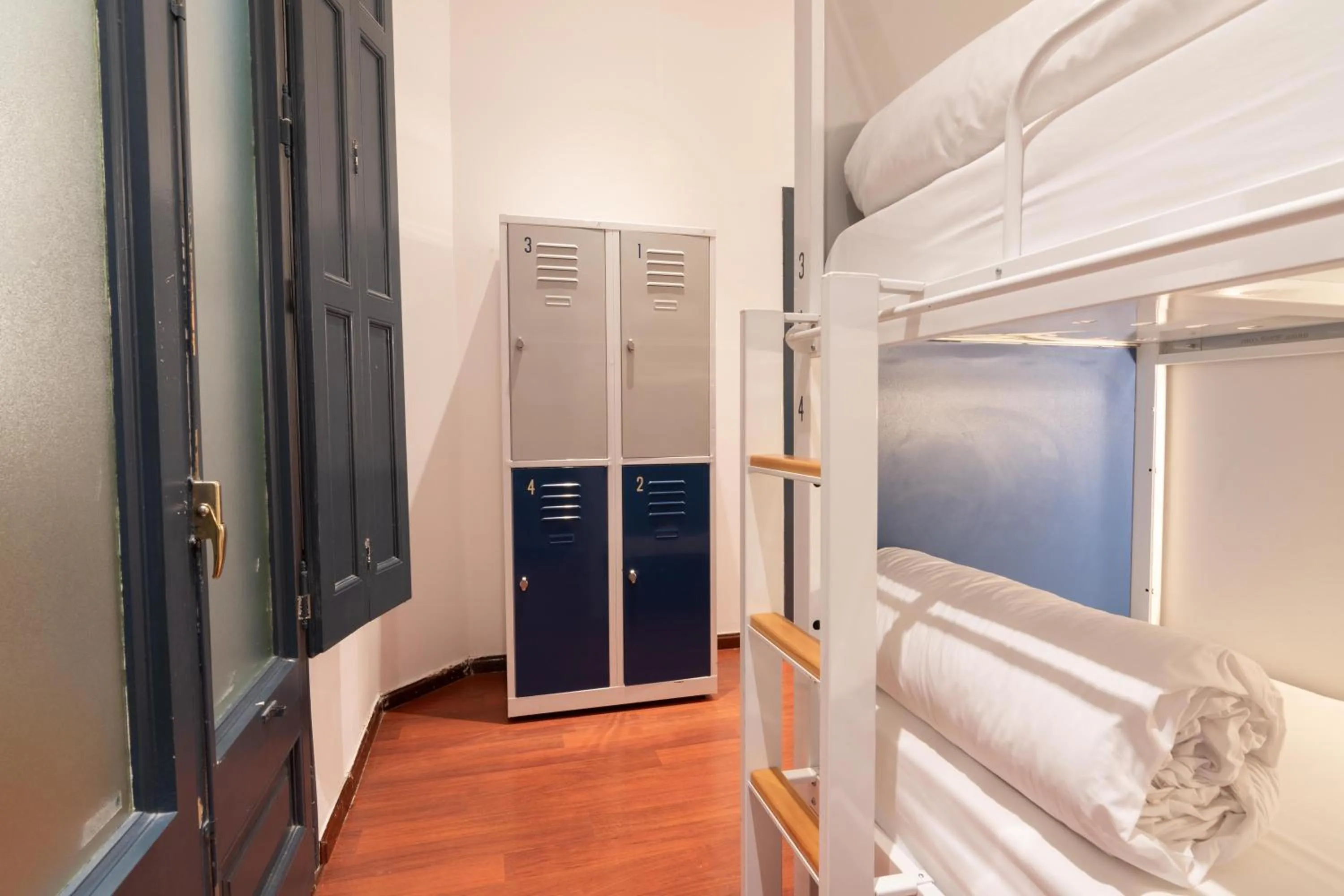 Bed in The Central House Barcelona Gracia