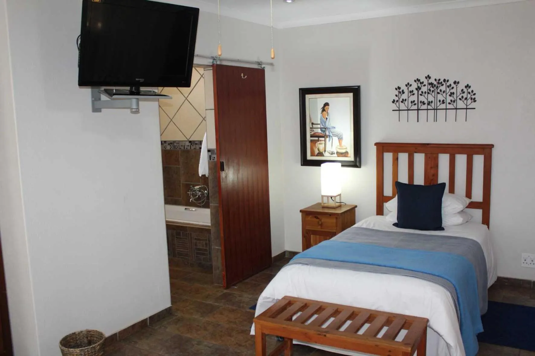 Bed in Ngwenya Boutique Hotel