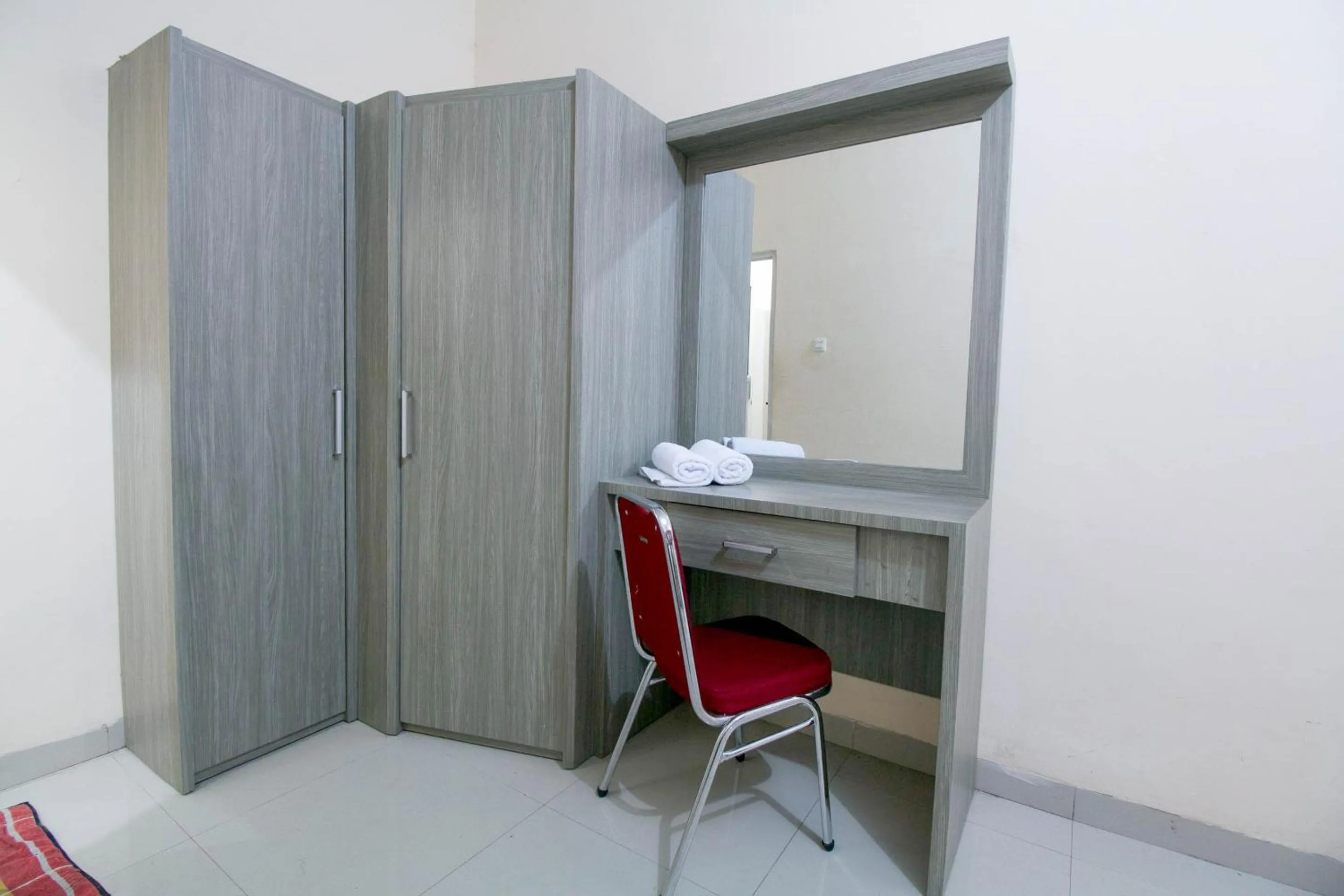 Bedroom in Grand Azizah Makassar RedPartner