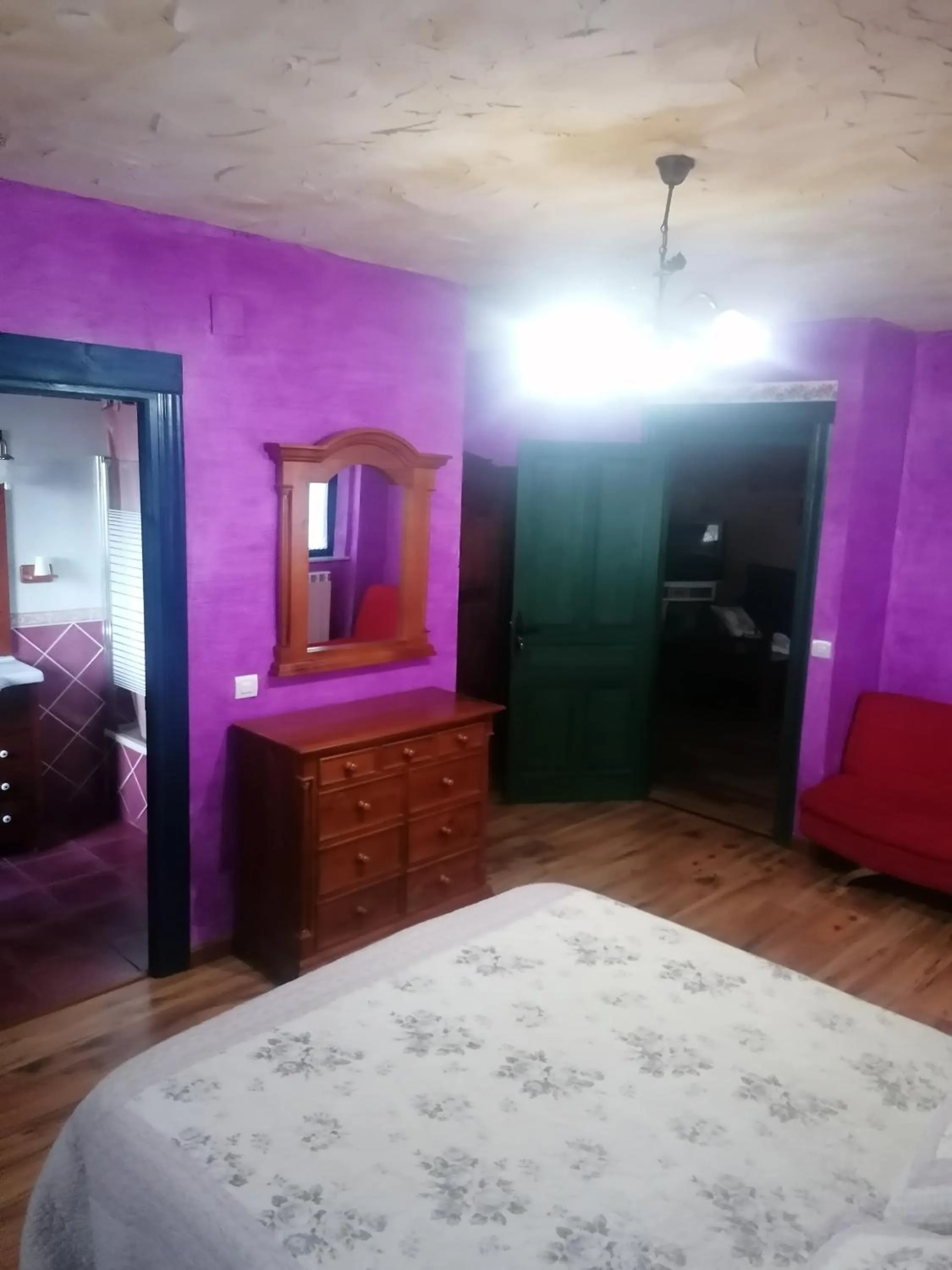 Bed in Hostería Casa Flor