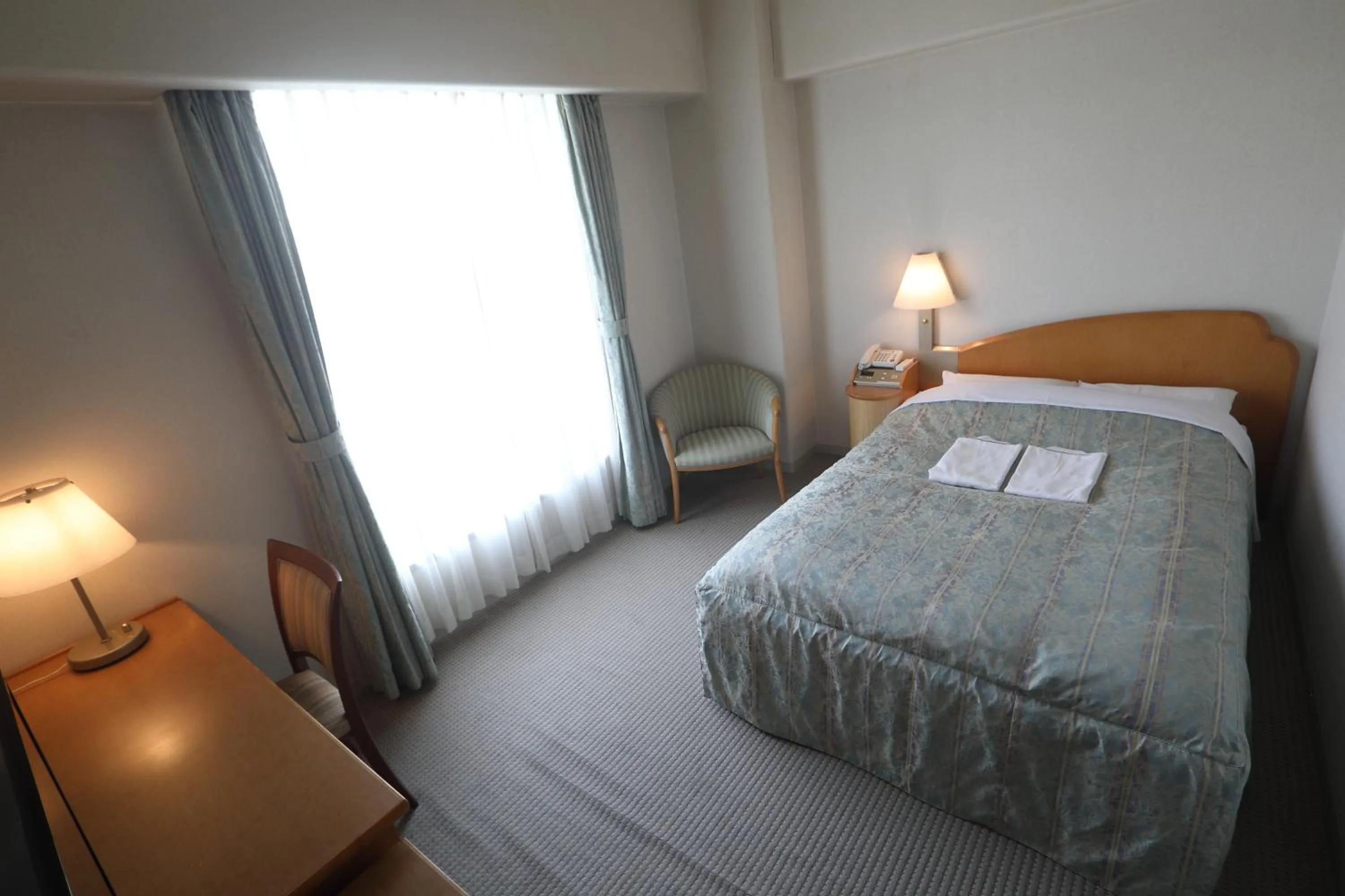 Bed in Plaza Inn Mizusawa