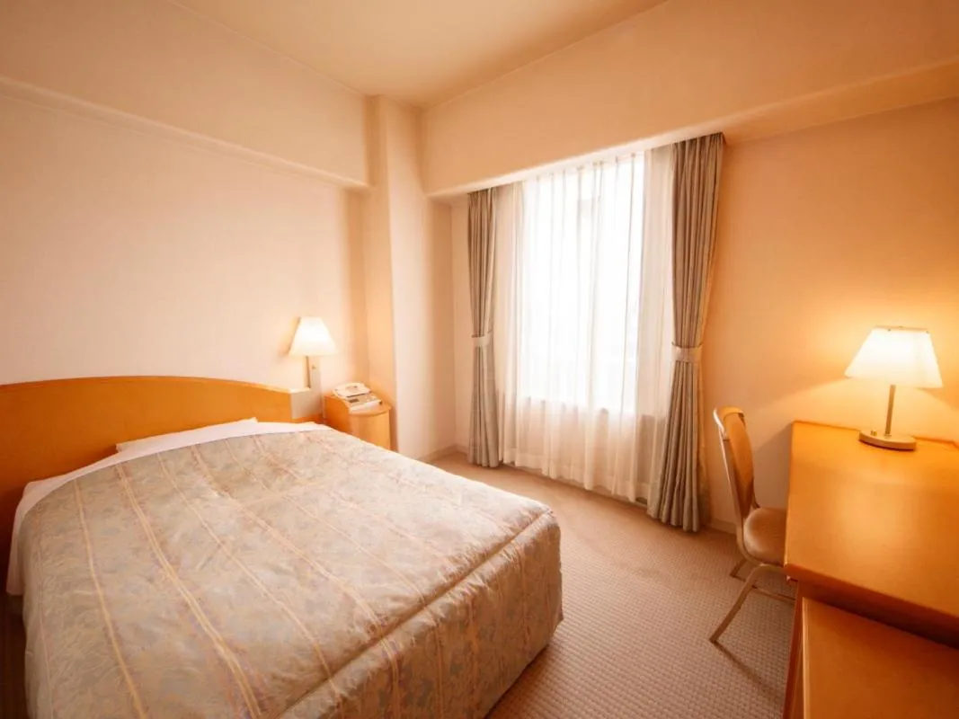 Bed in Plaza Inn Mizusawa