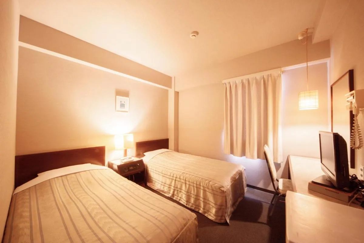 Bed in Plaza Inn Mizusawa