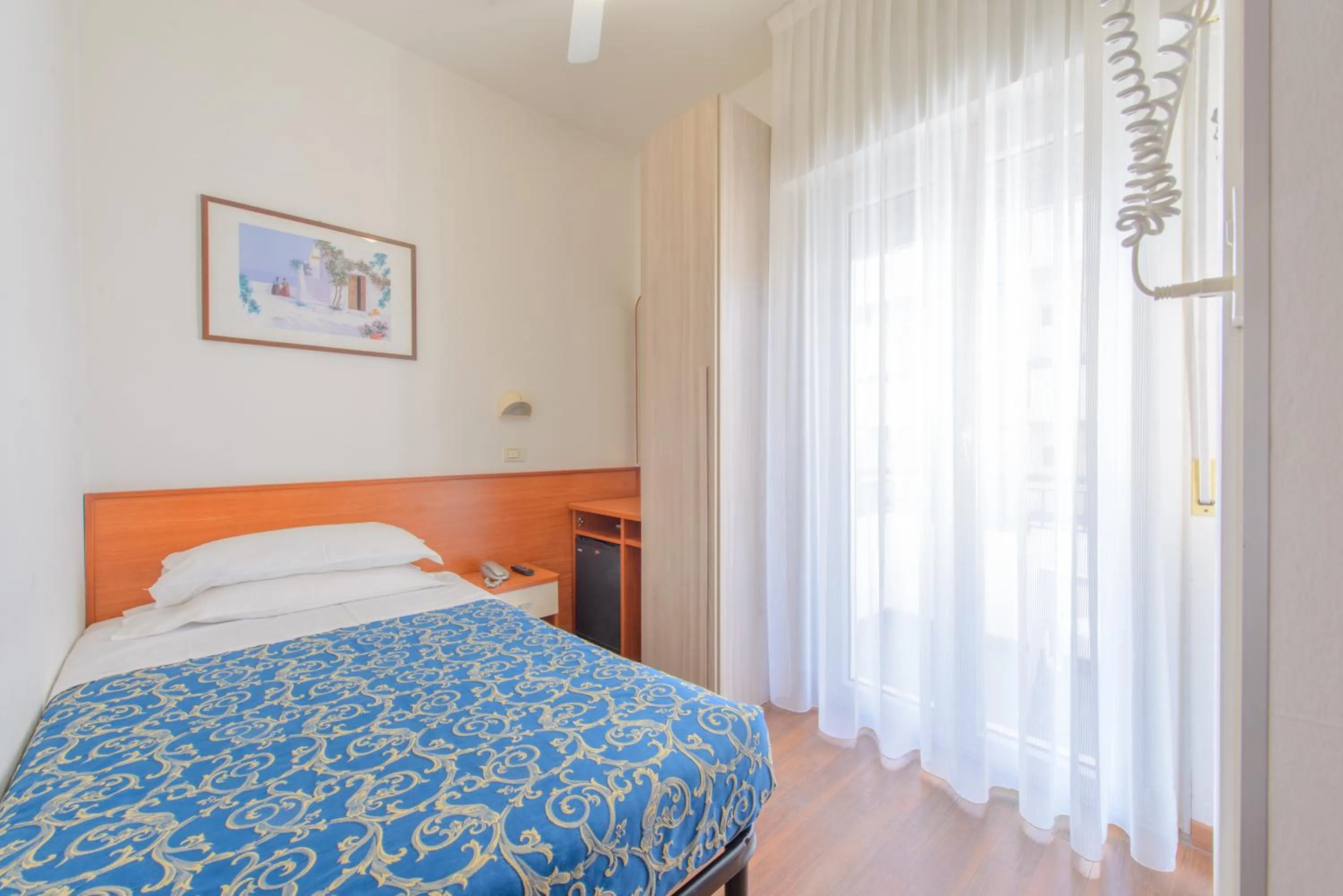 Bed in Hotel San Marino