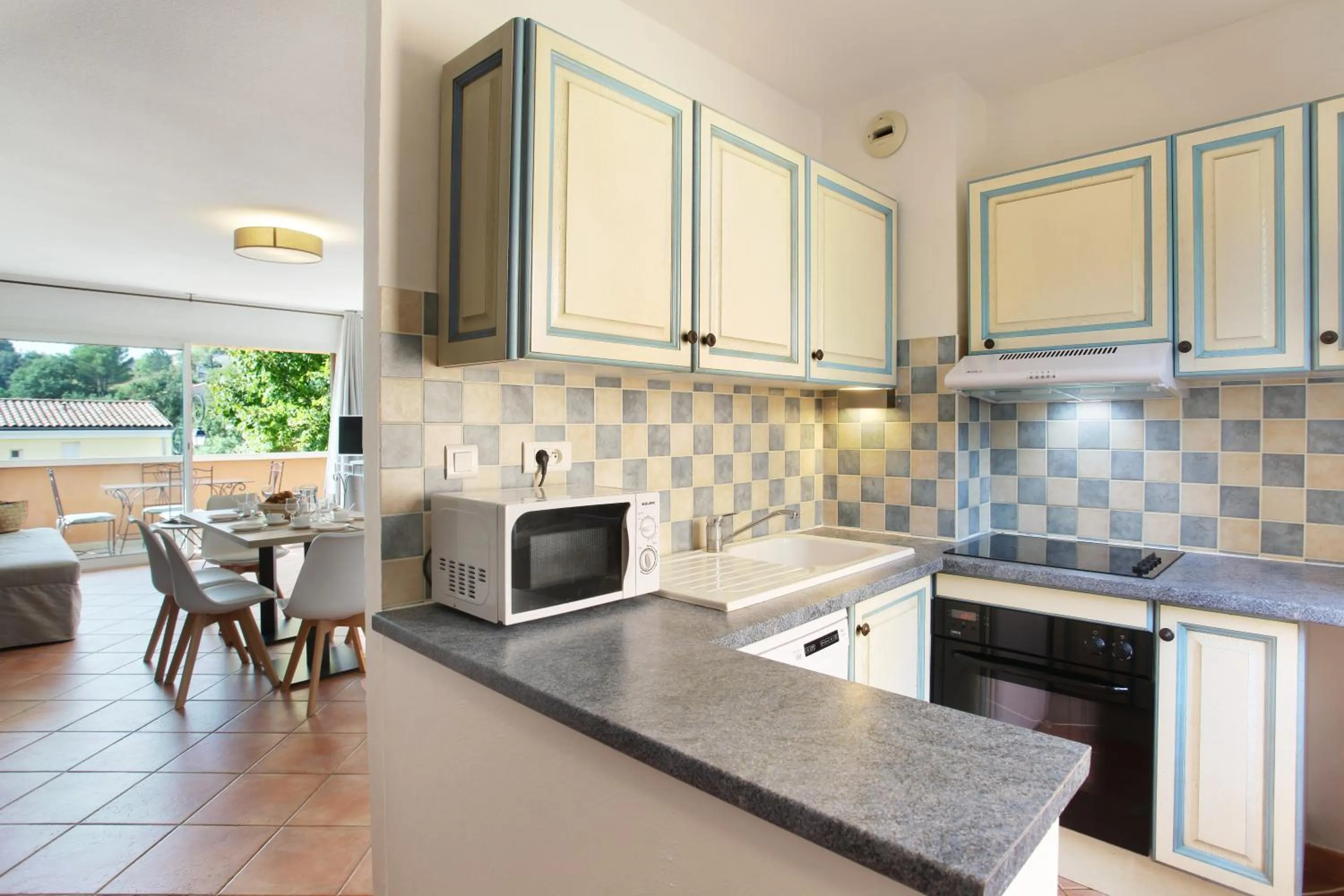 Kitchen or kitchenette in Résidence Odalys La Licorne de Haute Provence