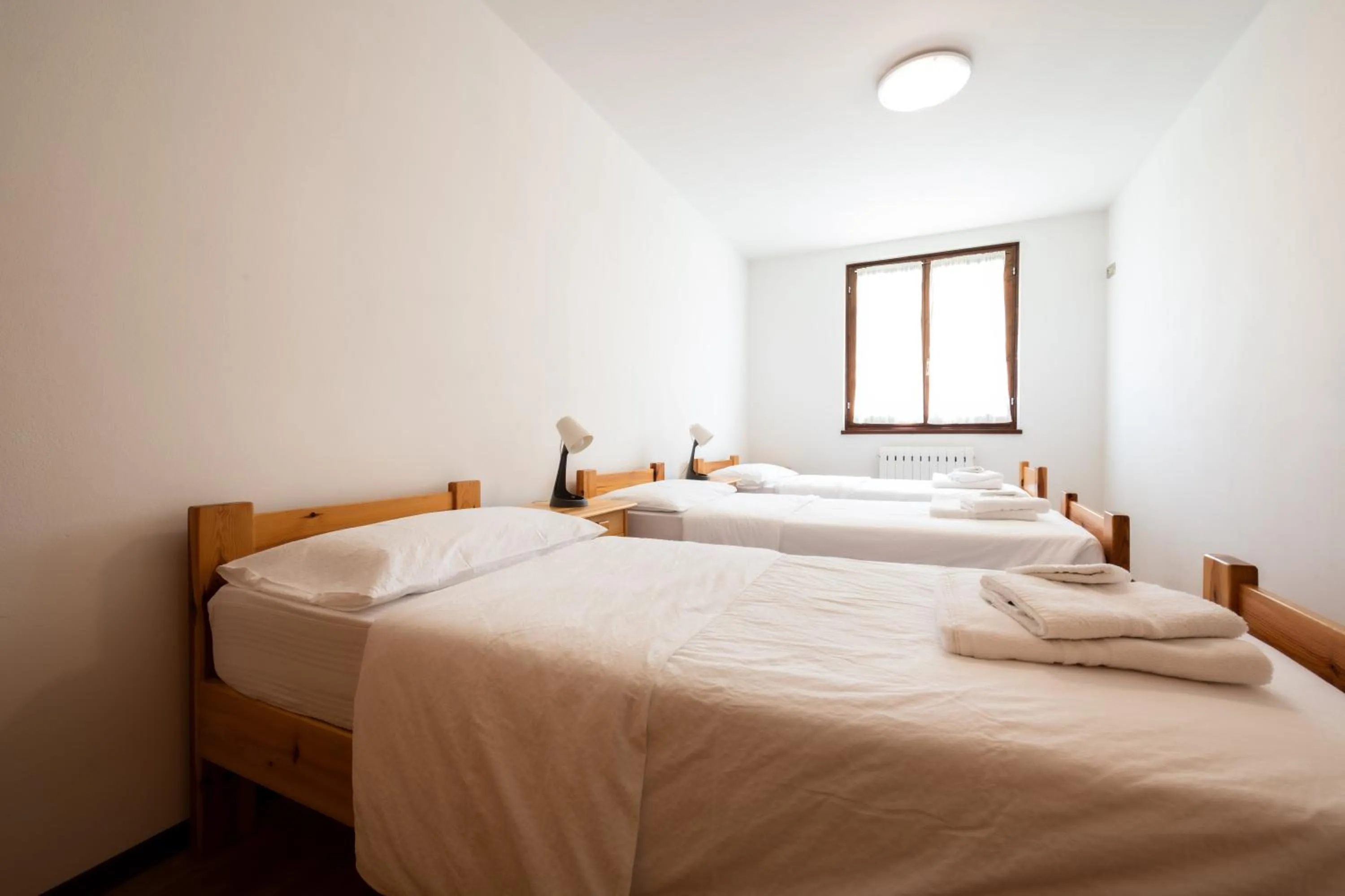 Bedroom, Bed in Appartamenti Lembondel - Ledro