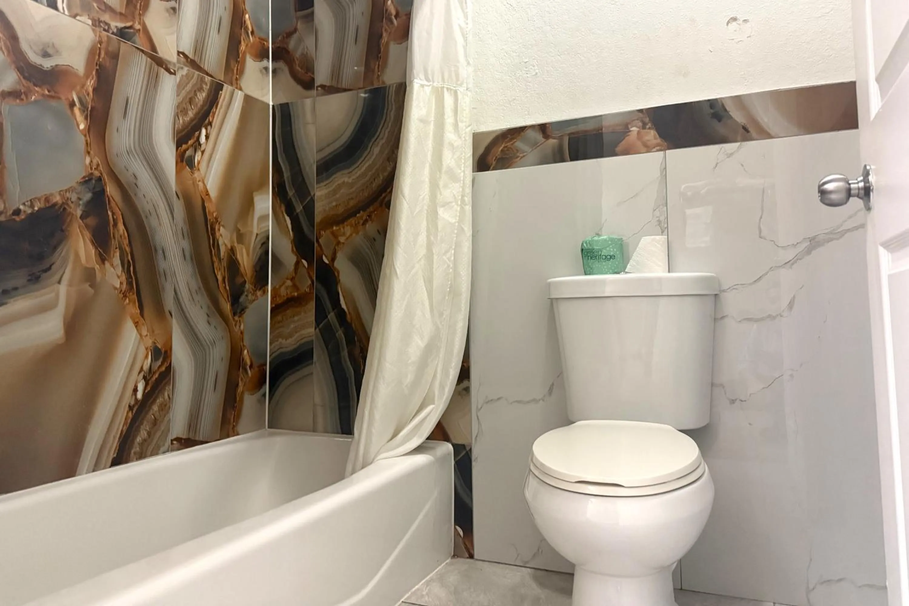 Bathroom in Hotel O Regency Suites Houston - IAH Beltway 8