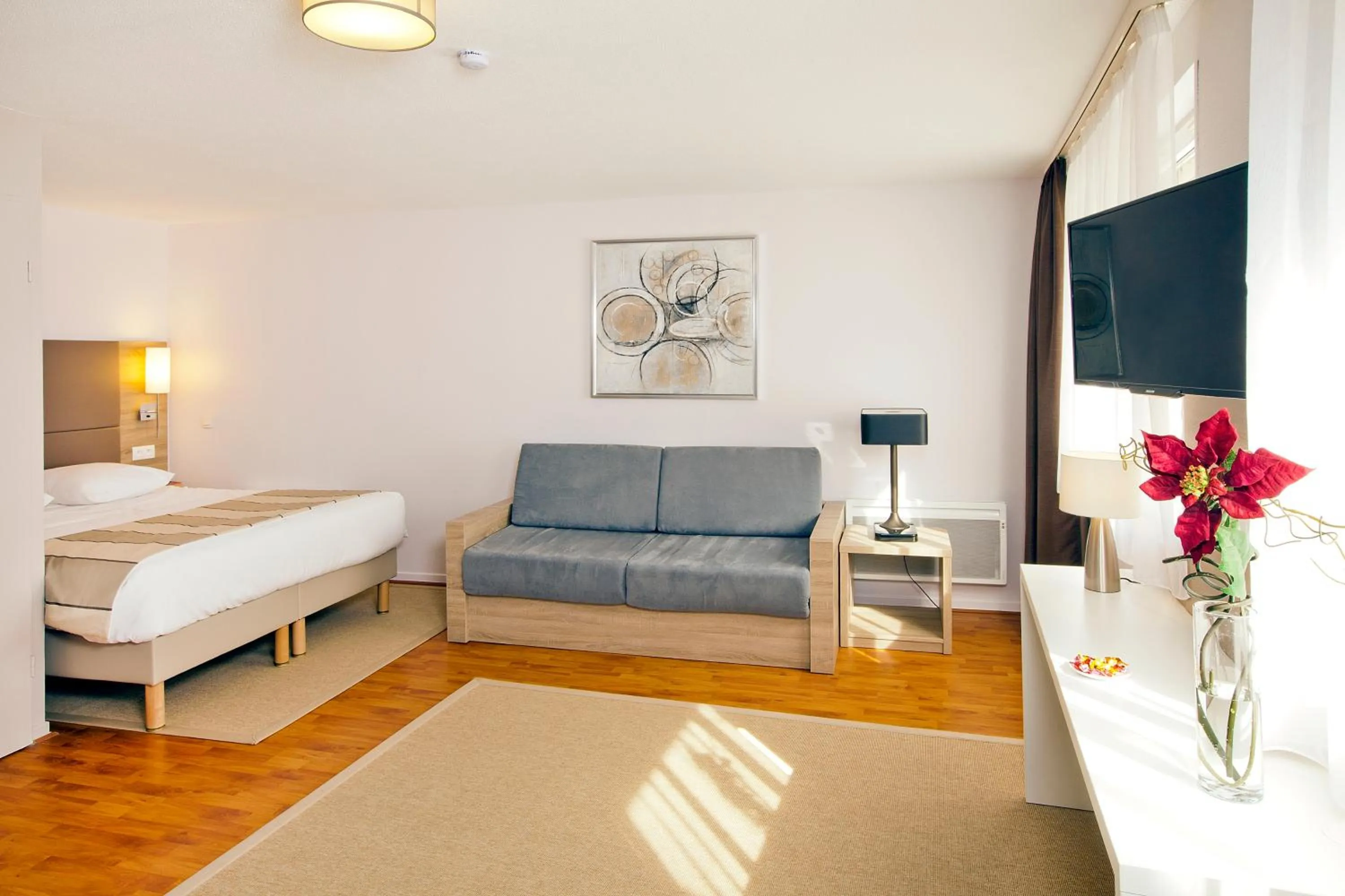 Bedroom, Bed in Séjours & Affaires Strasbourg Kleber