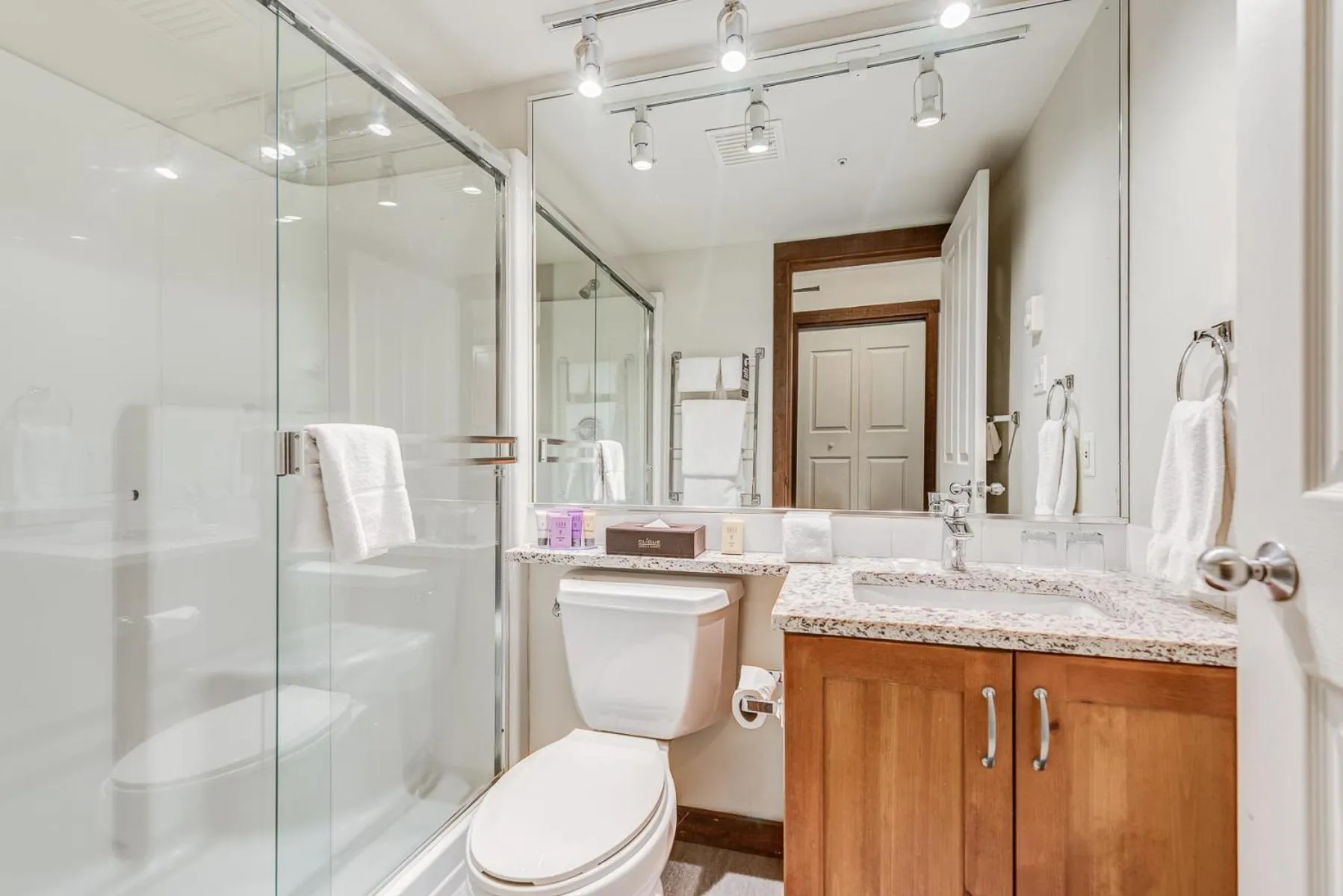 Shower in Blackcomb Springs Suites by CLIQUE
