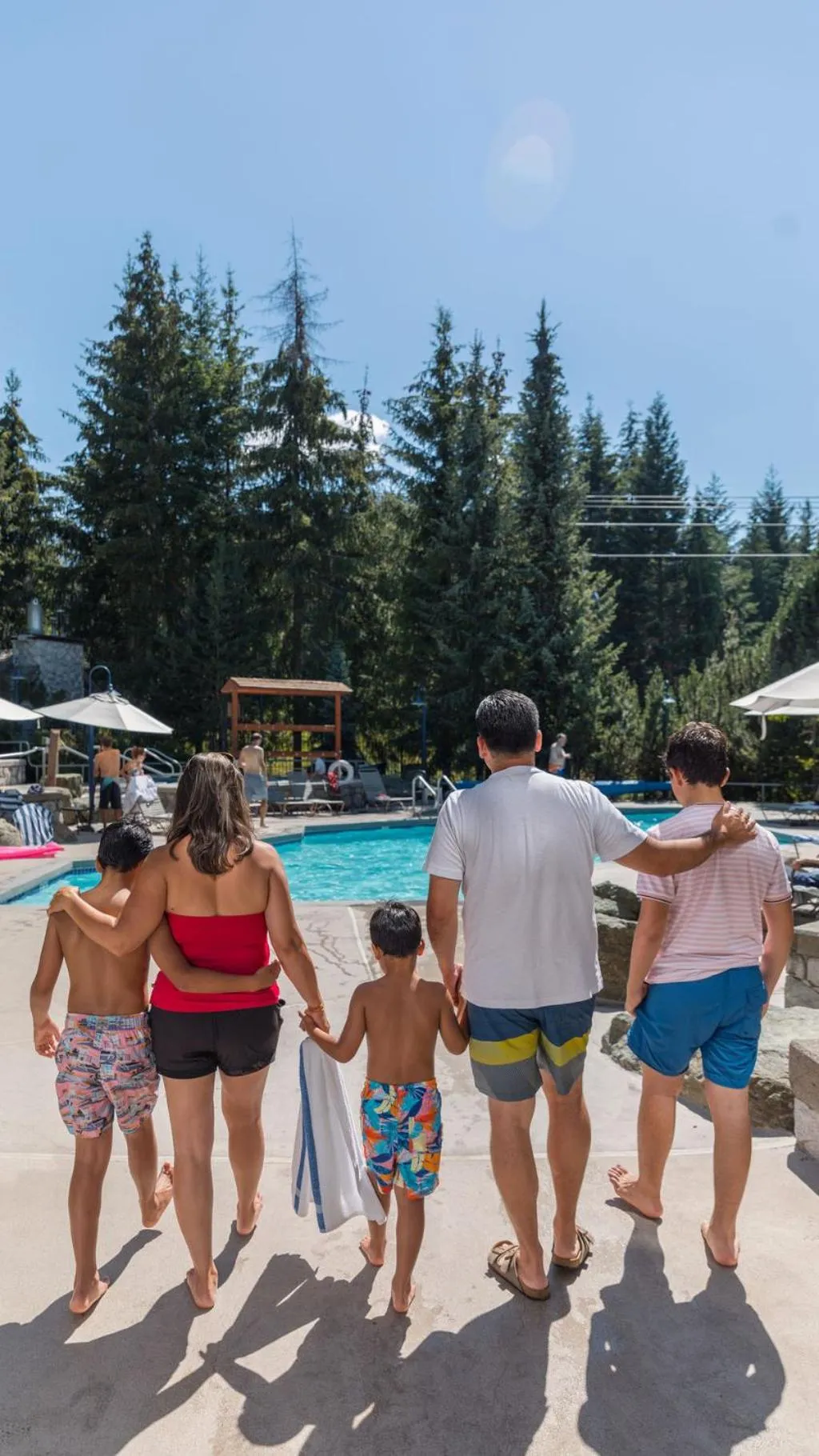 Swimming pool in Blackcomb Springs Suites by CLIQUE