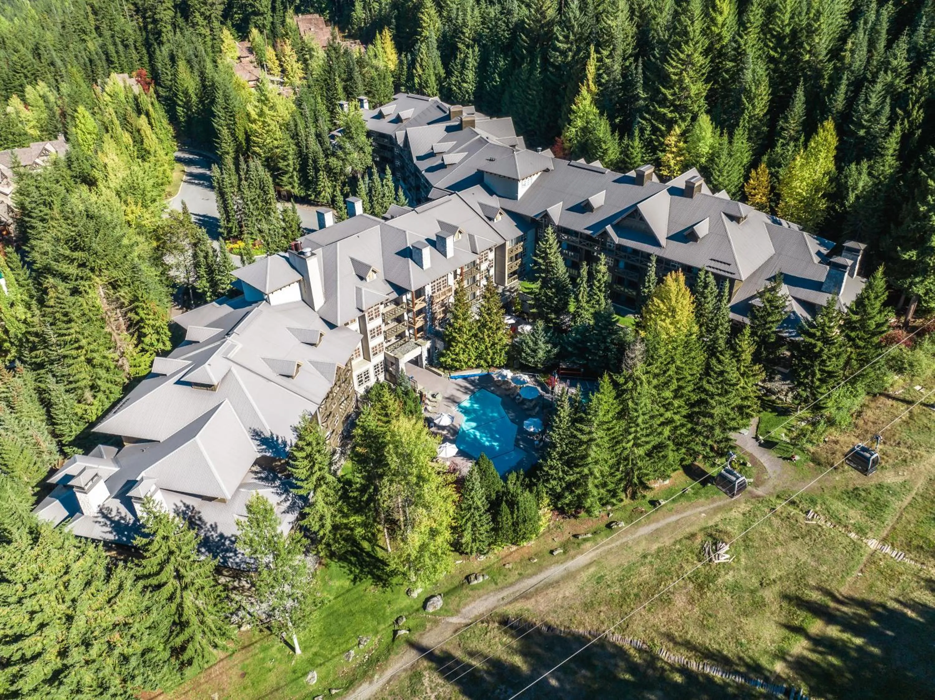 Property building in Blackcomb Springs Suites by CLIQUE