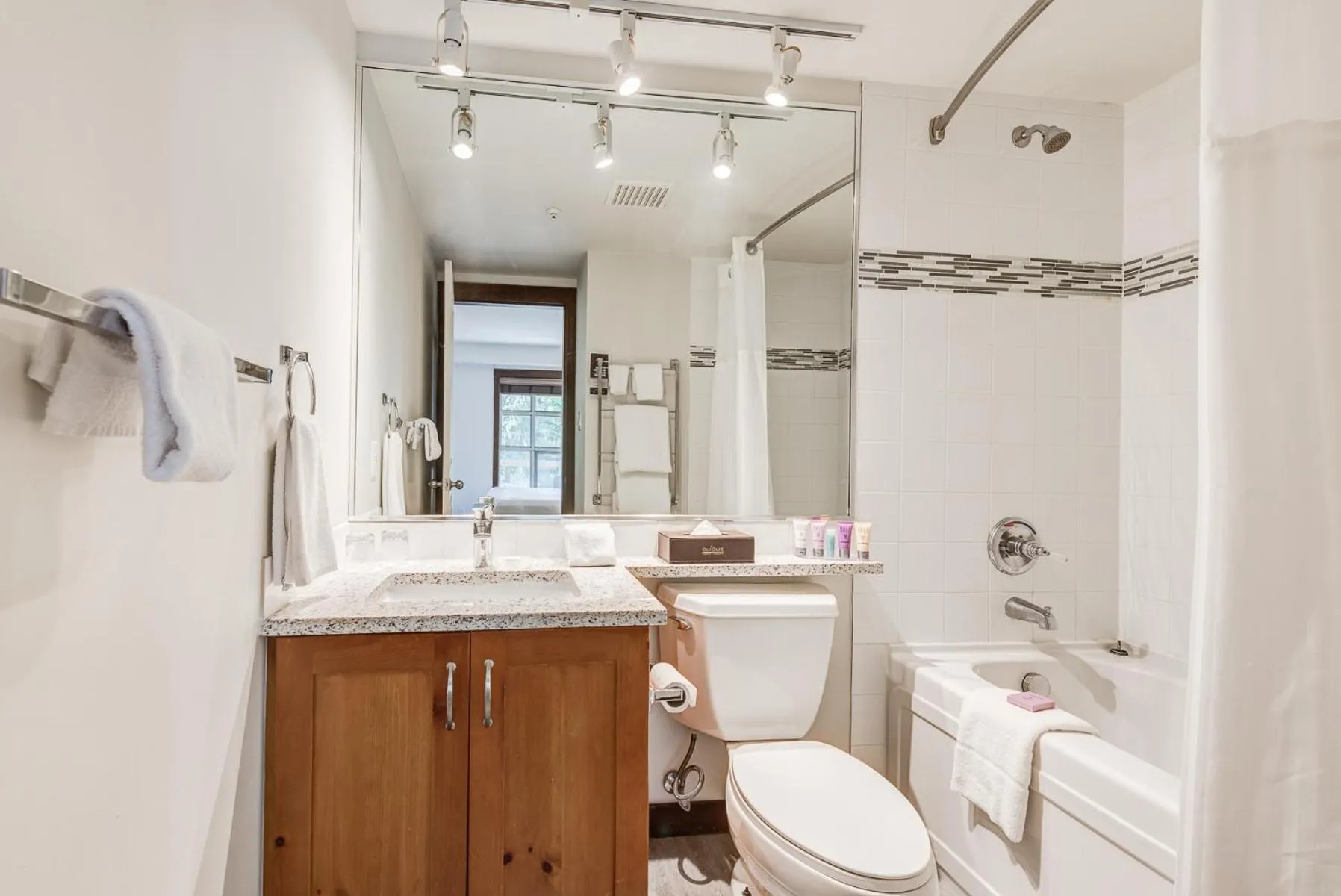 Shower in Blackcomb Springs Suites by CLIQUE