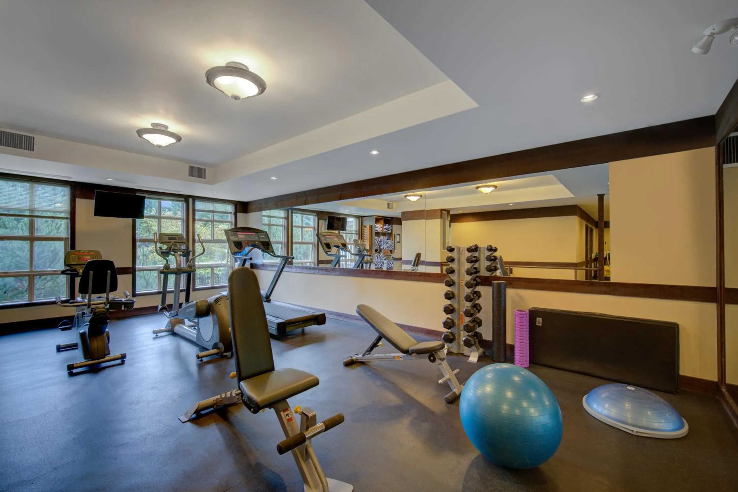 Fitness centre/facilities in Blackcomb Springs Suites by CLIQUE