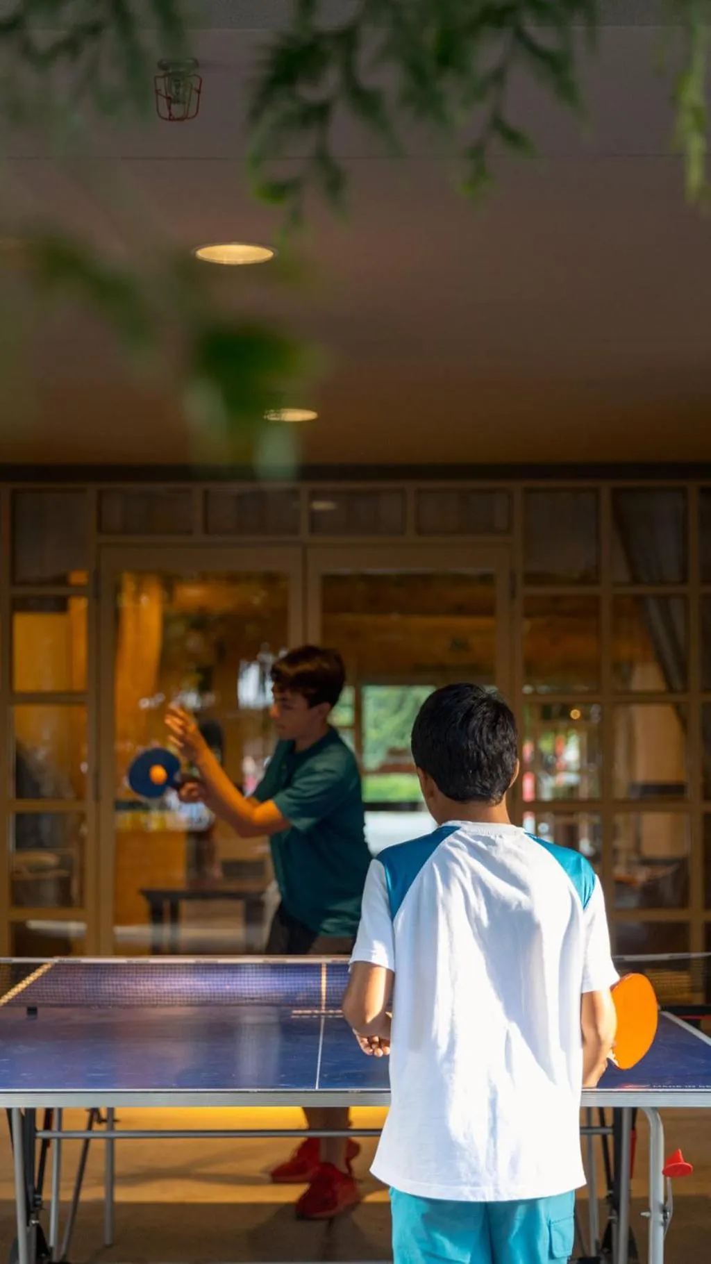 Table tennis in Blackcomb Springs Suites by CLIQUE