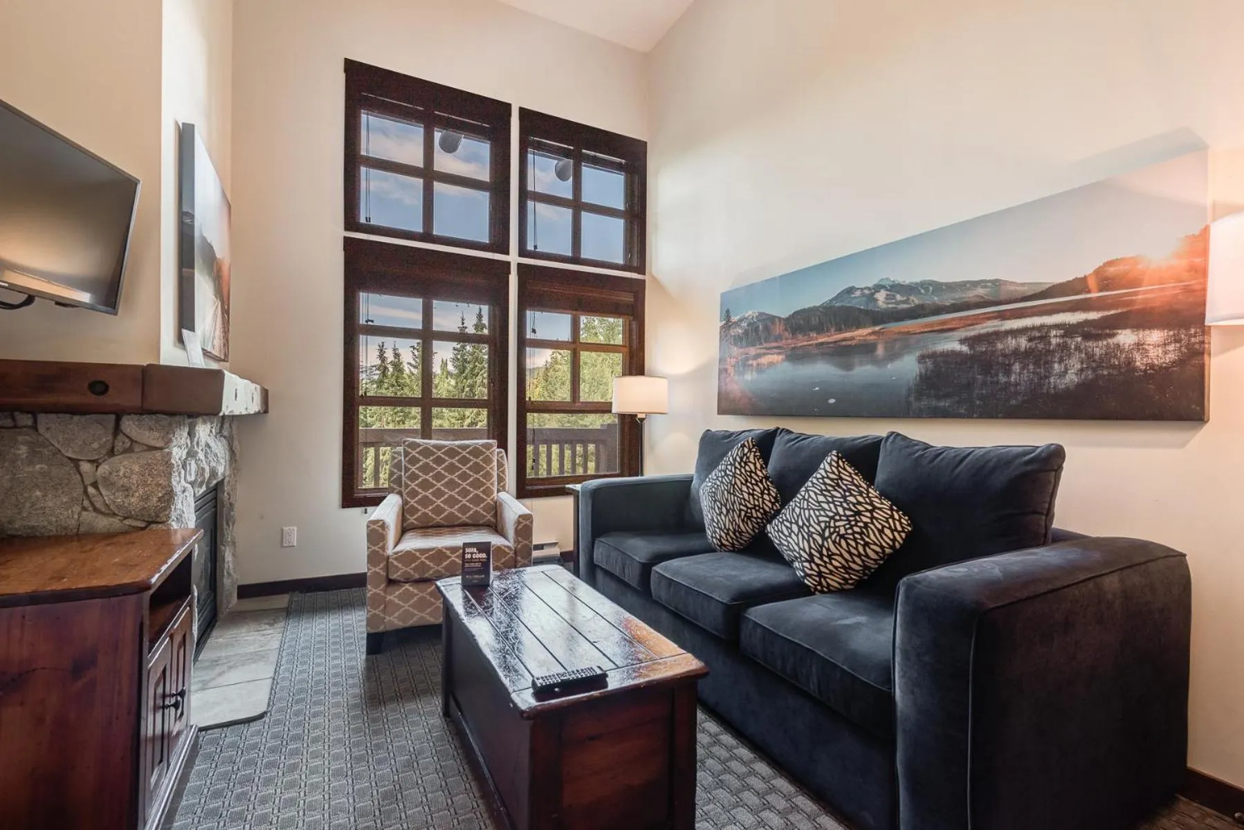 TV and multimedia in Blackcomb Springs Suites by CLIQUE