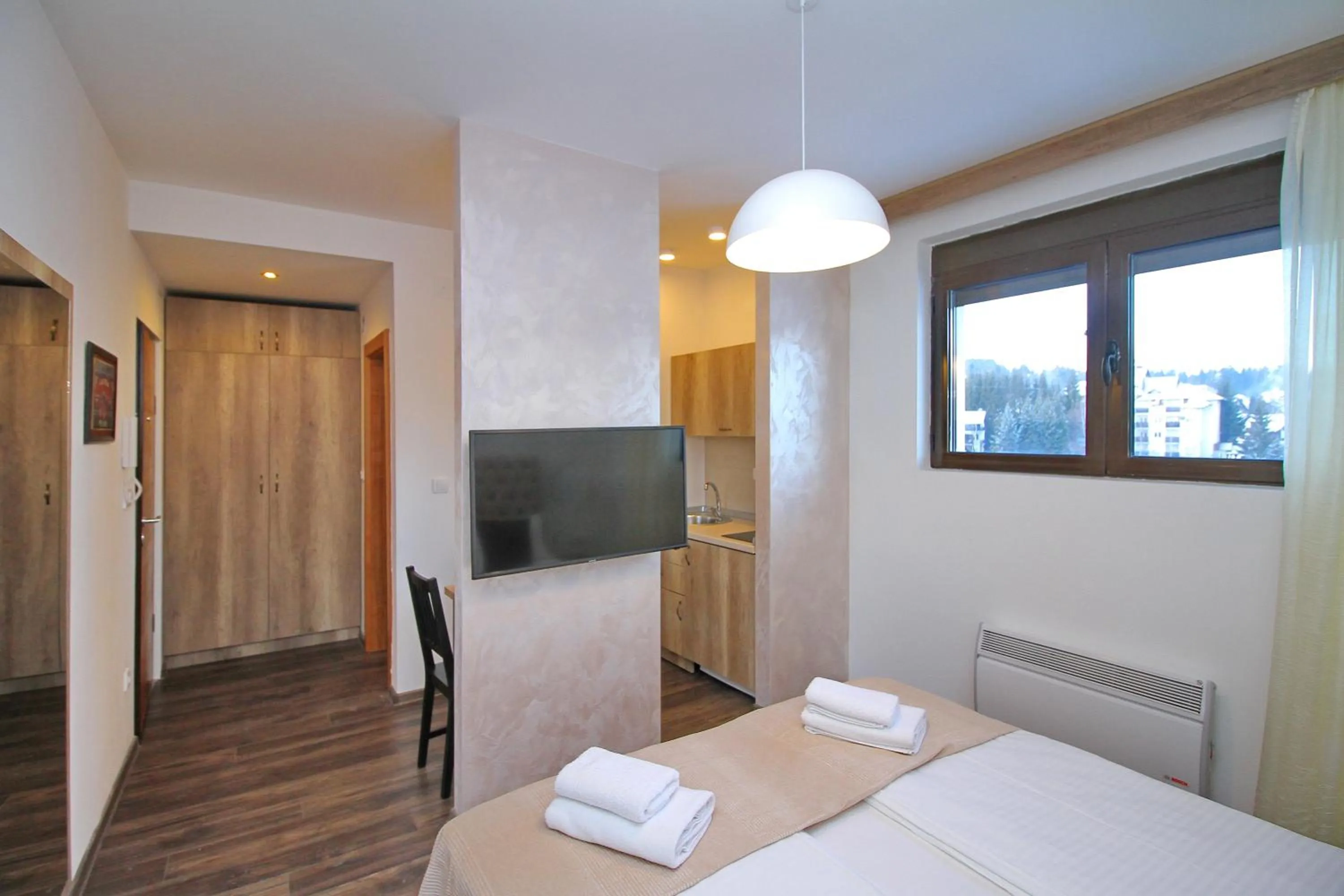 Photo of the whole room, Bed in All Seasons Residence