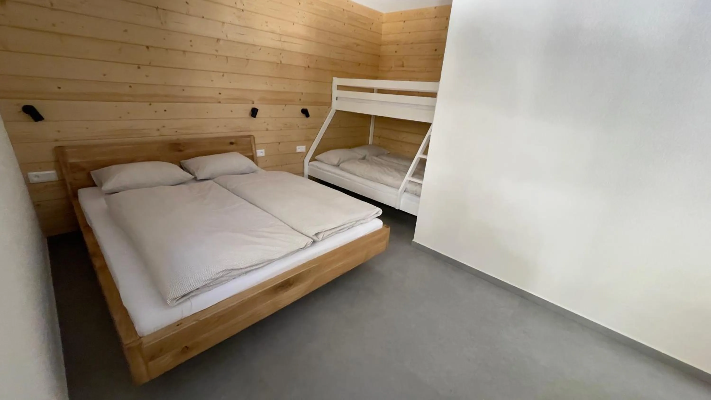 Bed in YASNA Apartments