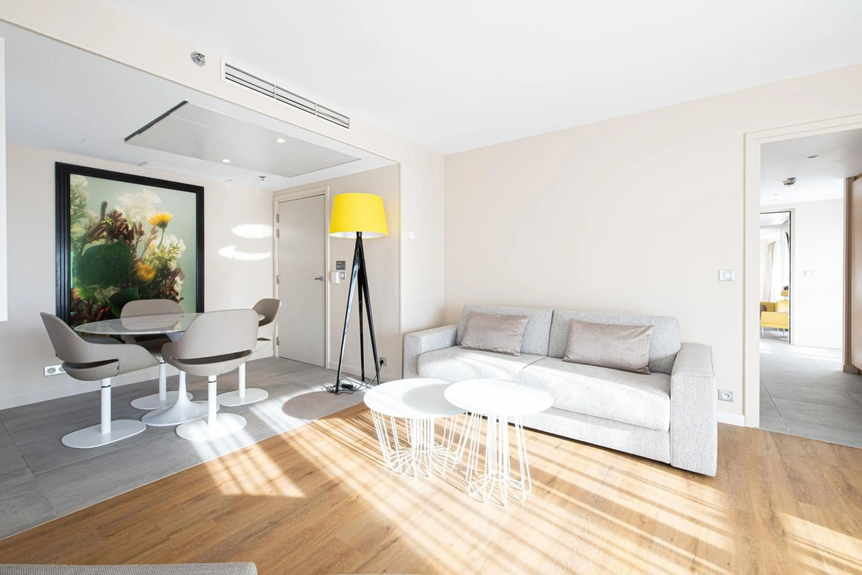 Living room, Bed in Renaissance Aix-en-Provence Hotel