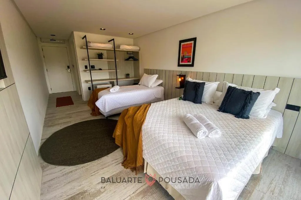 Bed in BALUARTE POUSADA