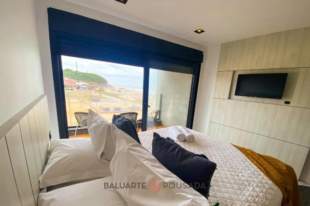 Bed in BALUARTE POUSADA