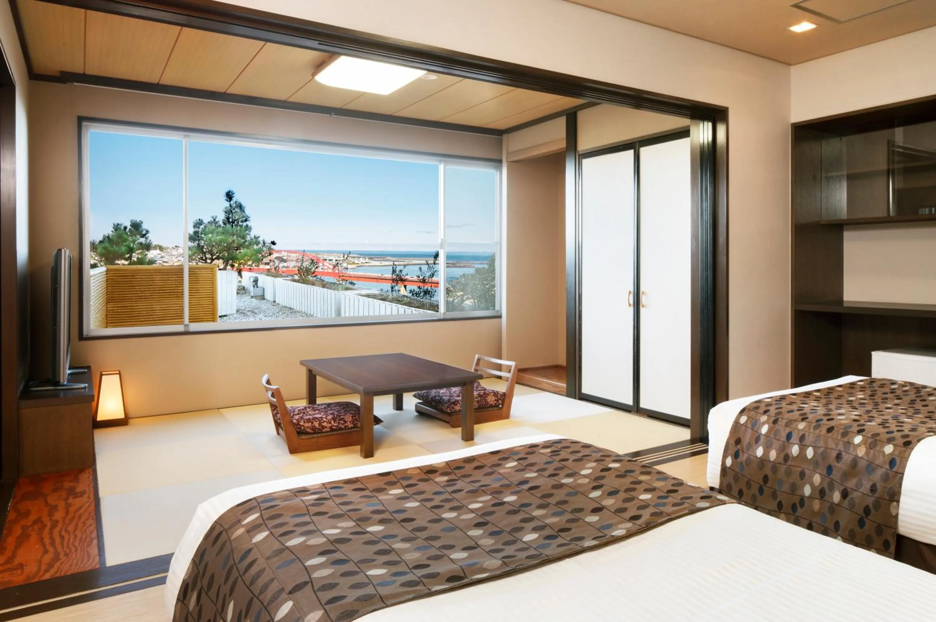 Photo of the whole room, Bed in KAMENOI HOTEL Oarai