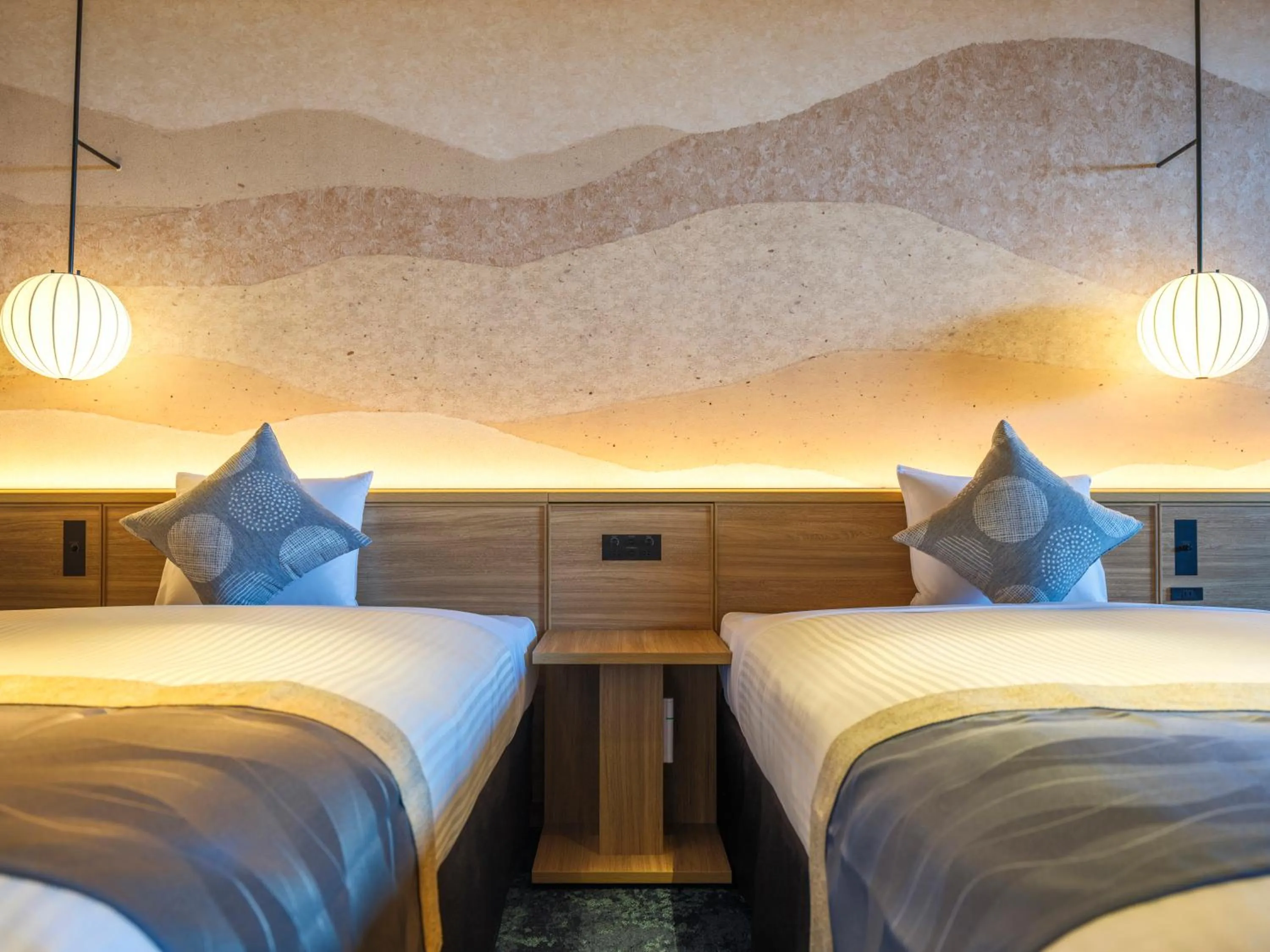 Bed in KAMENOI HOTEL Oarai