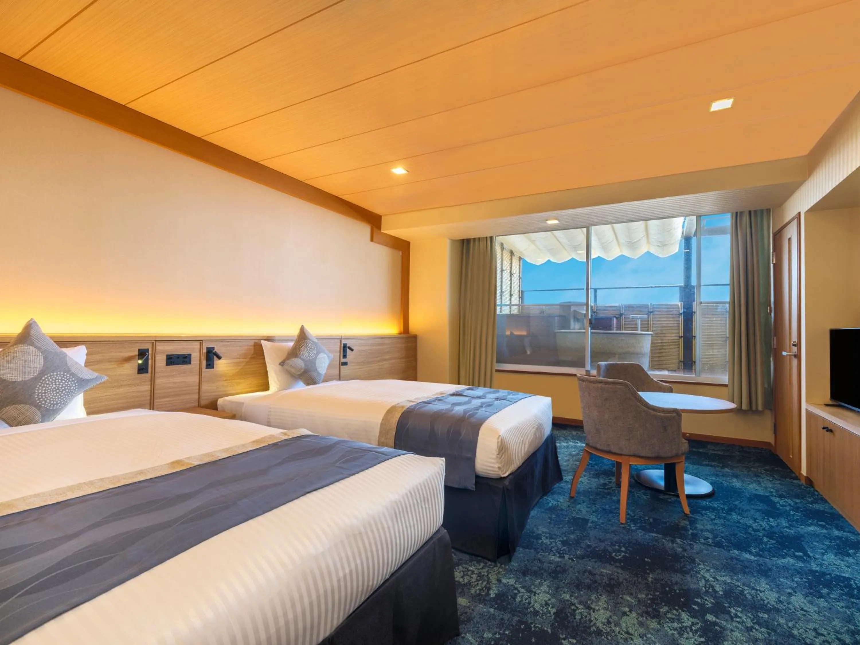 Photo of the whole room, Bed in KAMENOI HOTEL Oarai