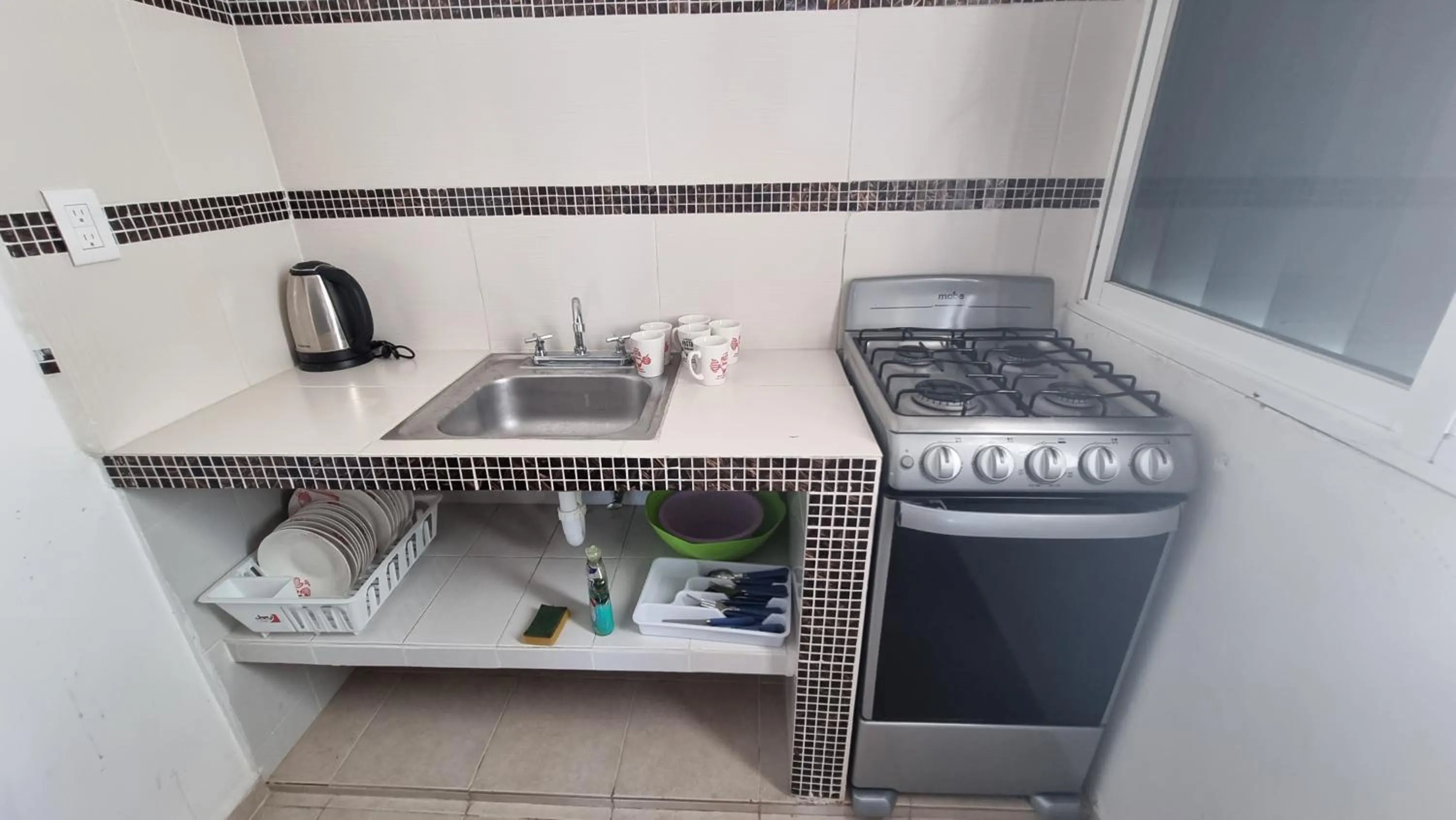 Kitchen or kitchenette in A una calle del ado 5ta avenida