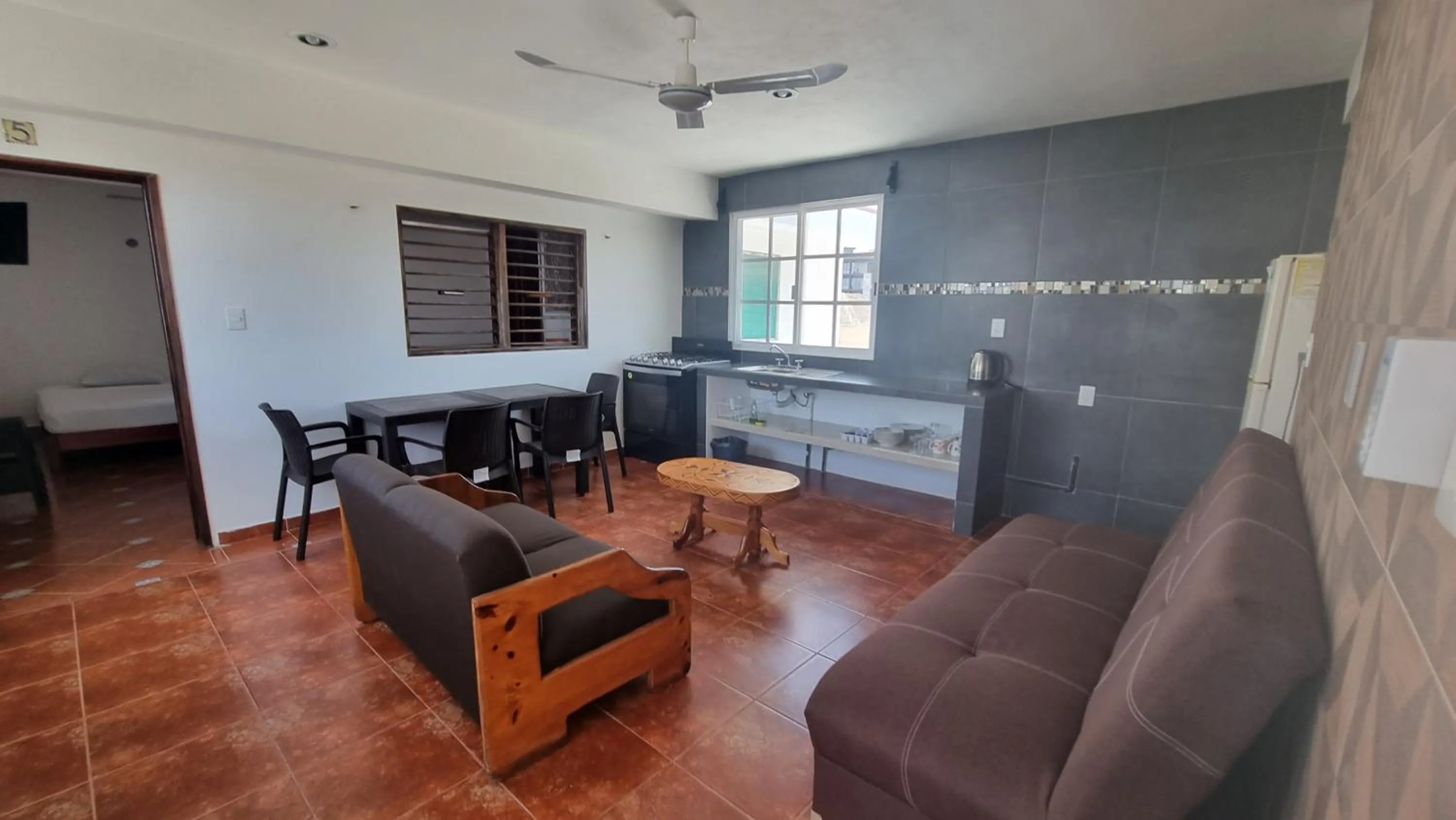 Living room in A una calle del ado 5ta avenida