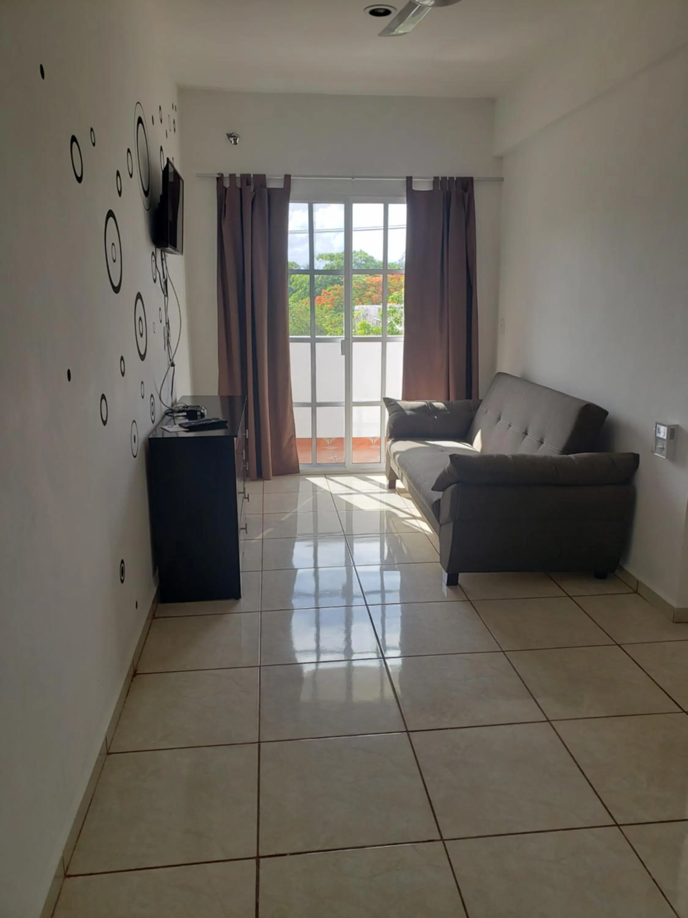 Living room in A una calle del ado 5ta avenida