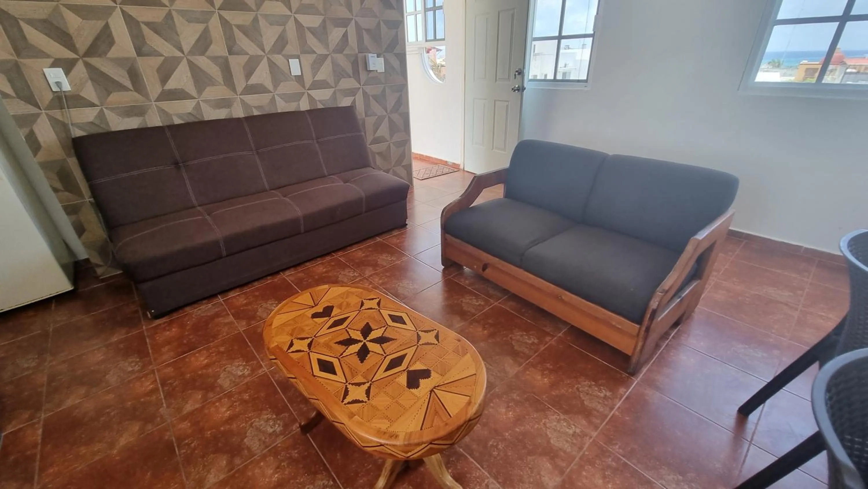 Living room in A una calle del ado 5ta avenida