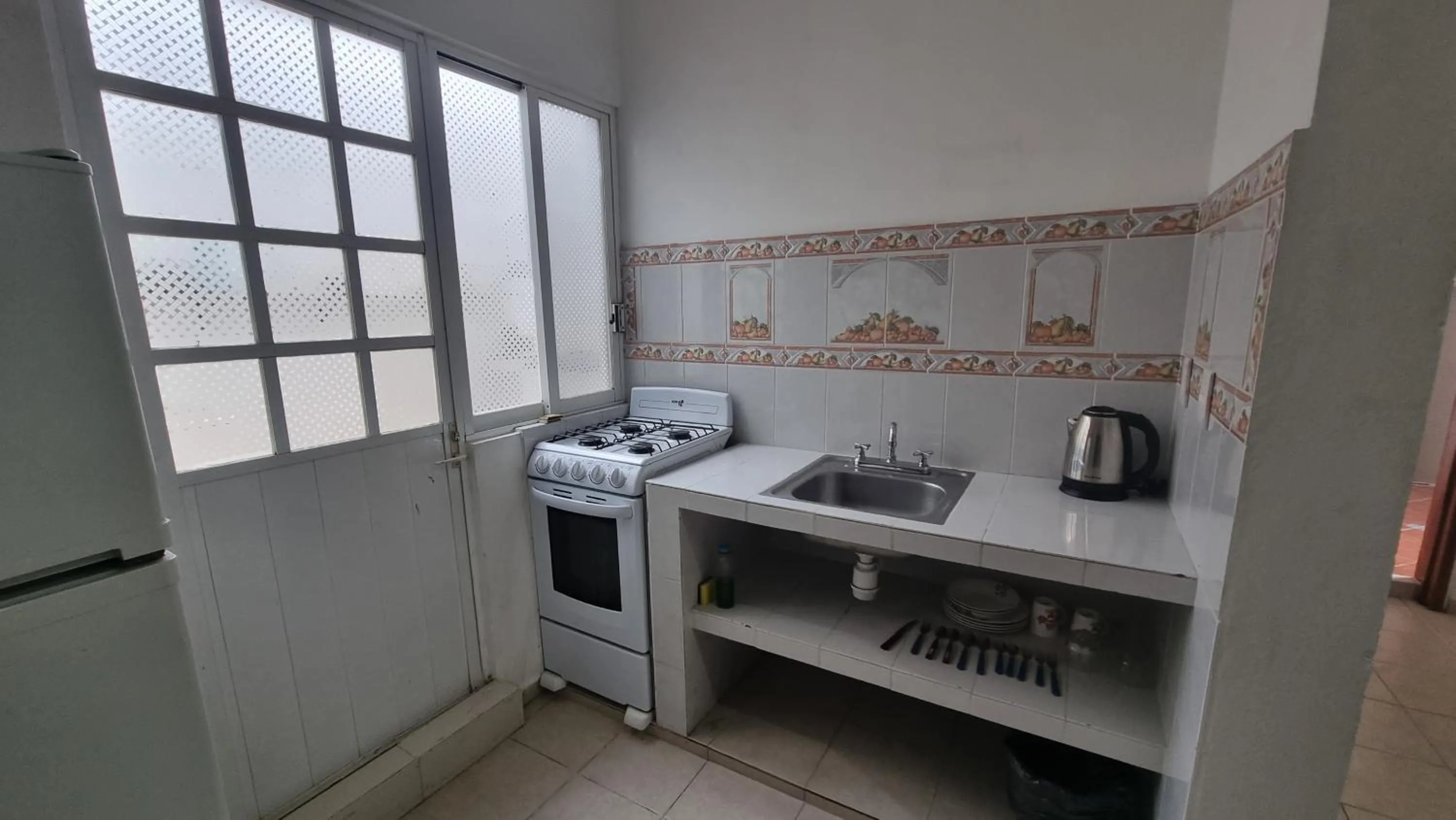 Kitchen or kitchenette in A una calle del ado 5ta avenida