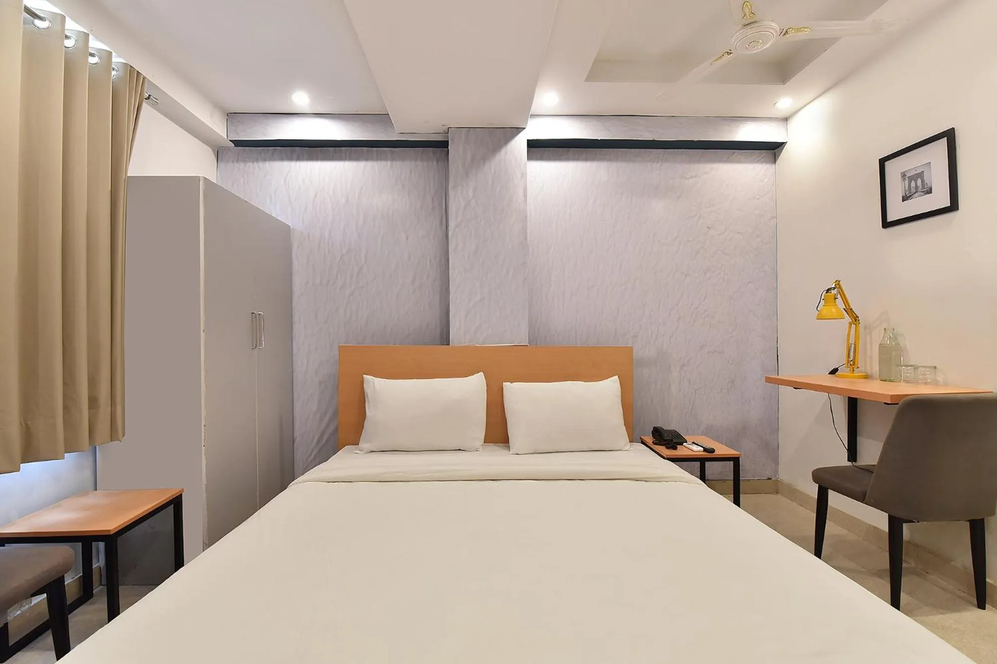 Bed in FabHotel Rushank Palace