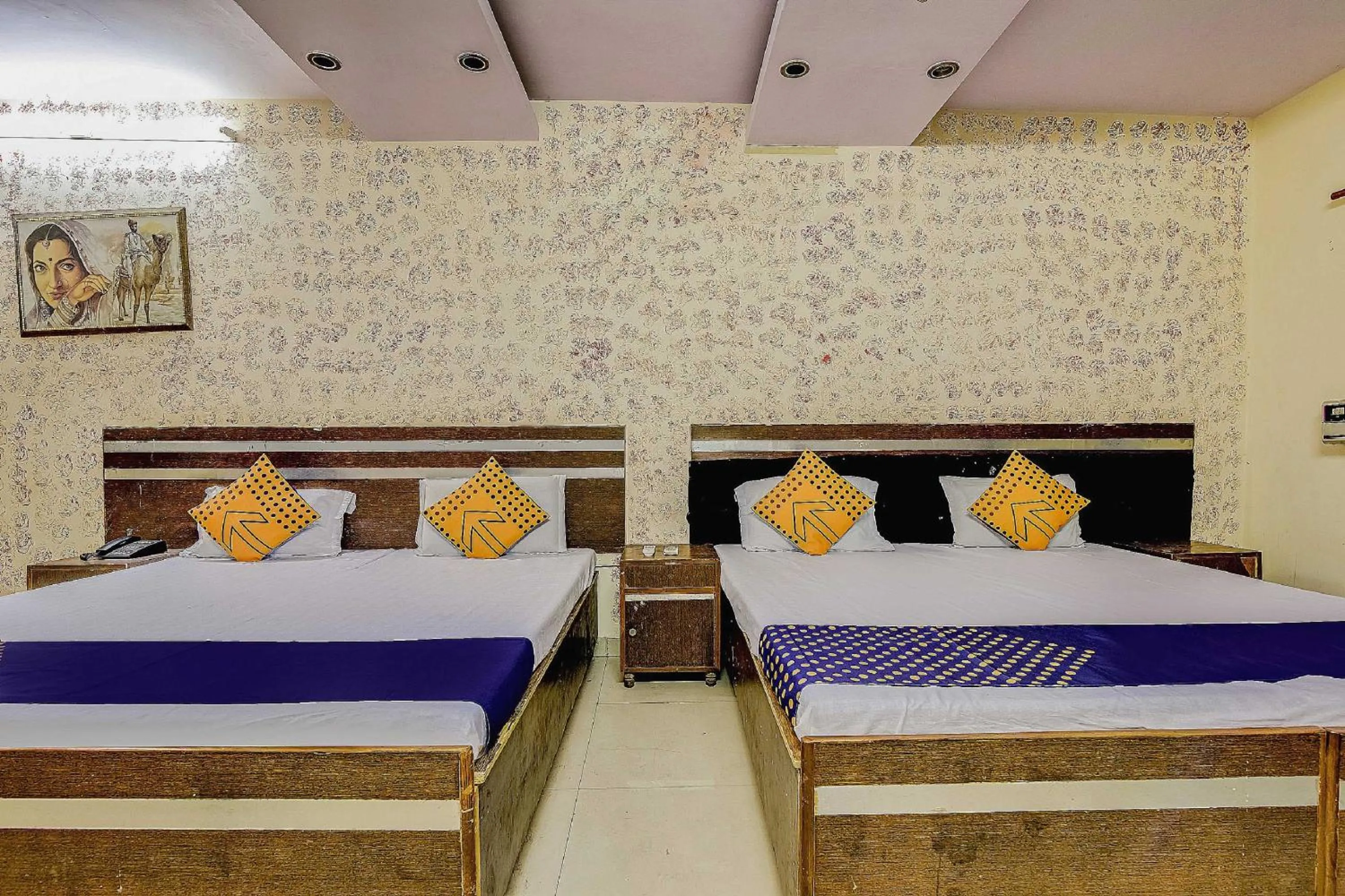 Bedroom, Bed in Spot On Swagat Palace